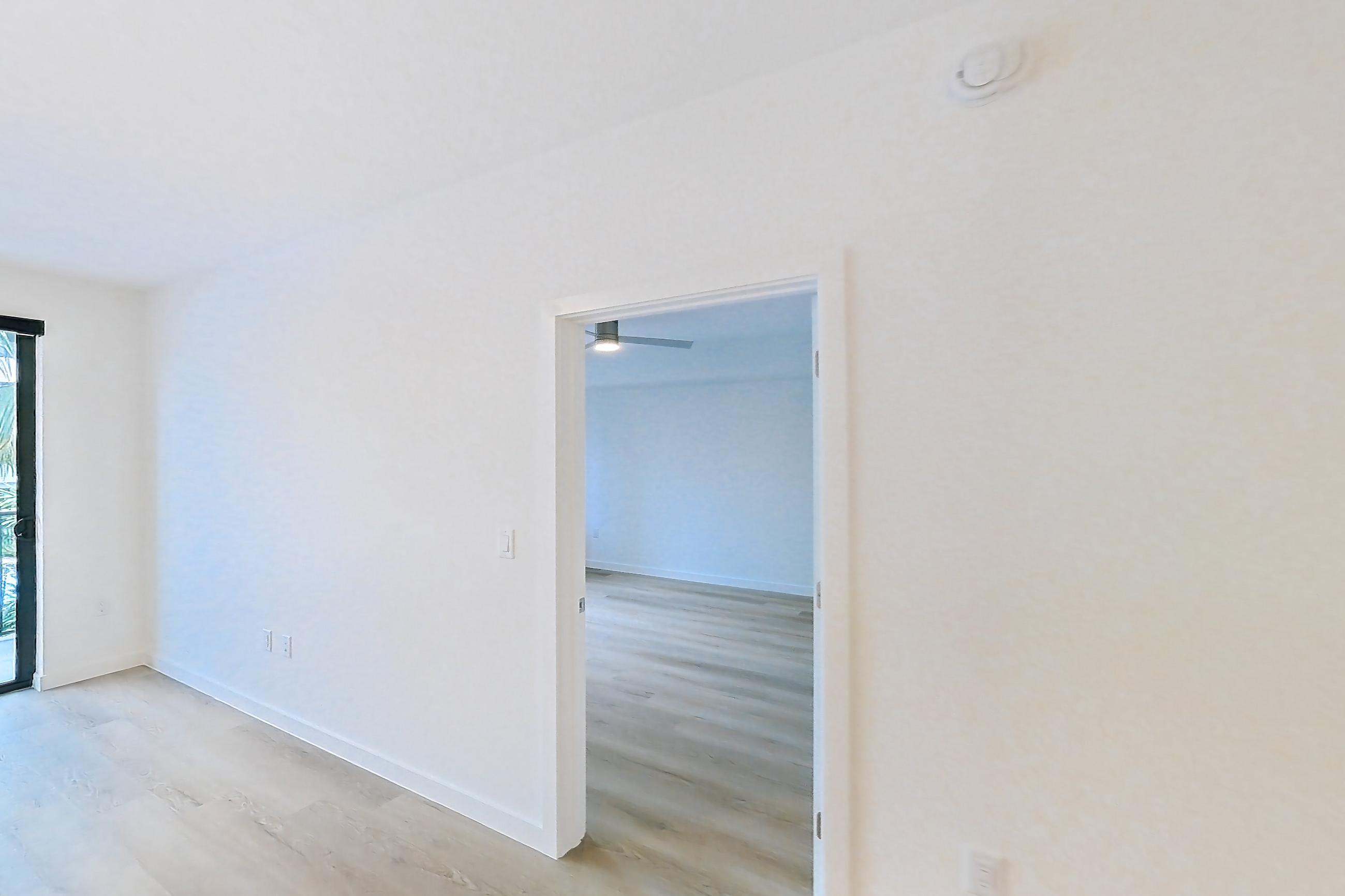 Living space in Apartment 203 at Caroline Pompano Beach, B1 floor plan