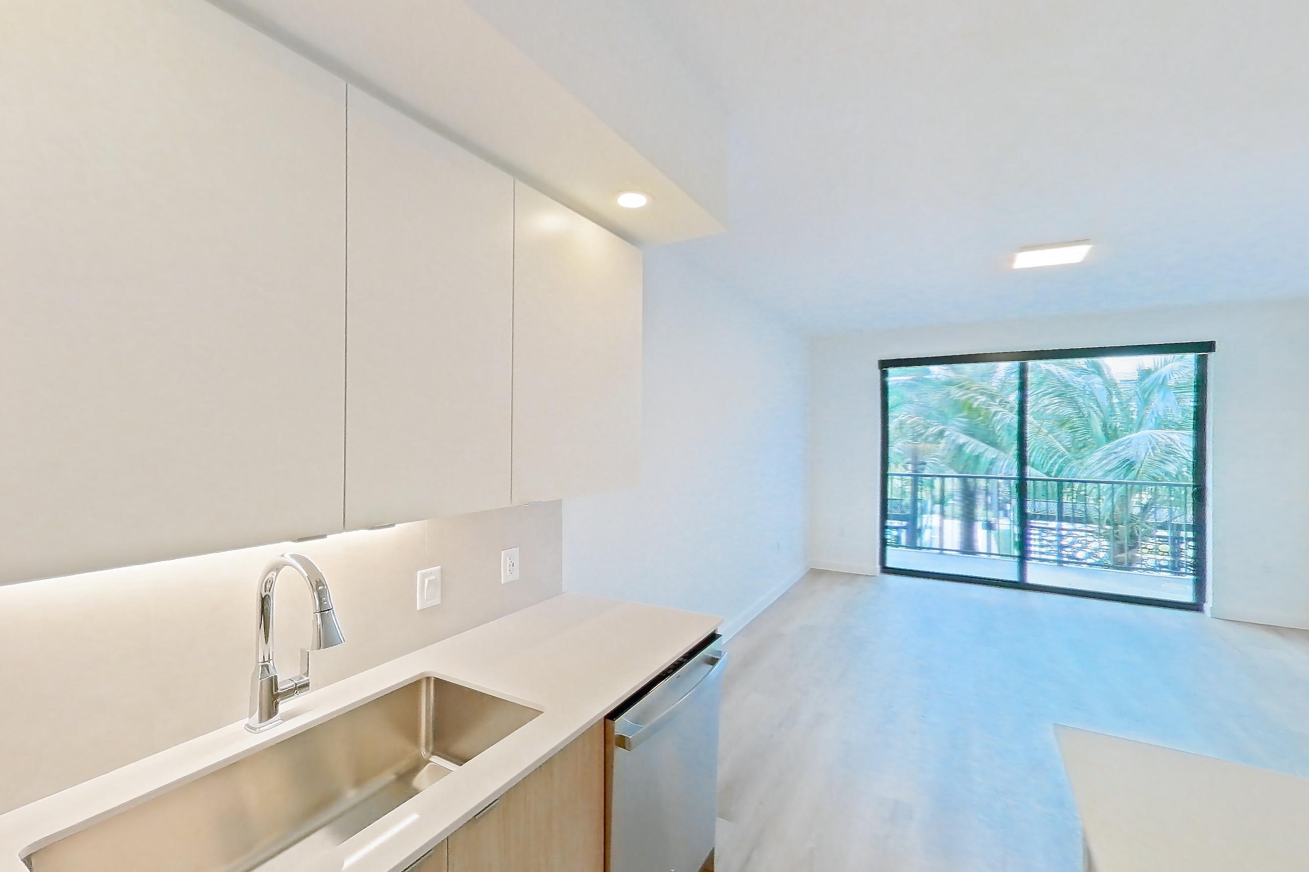 Kitchen in Apartment 204 at Caroline Pompano Beach, A2 floor plan