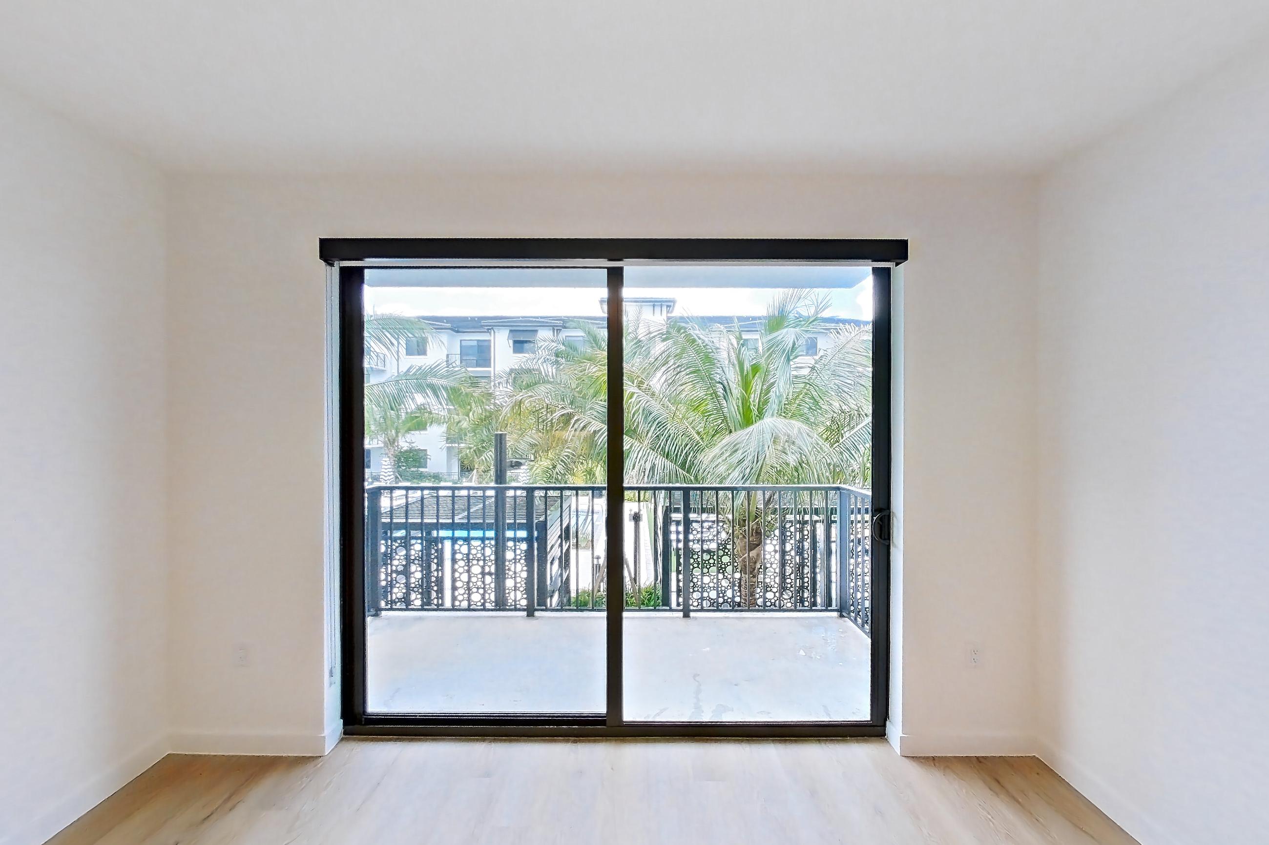 Living room in Apartment 204 at Caroline Pompano Beach, A2 floor plan