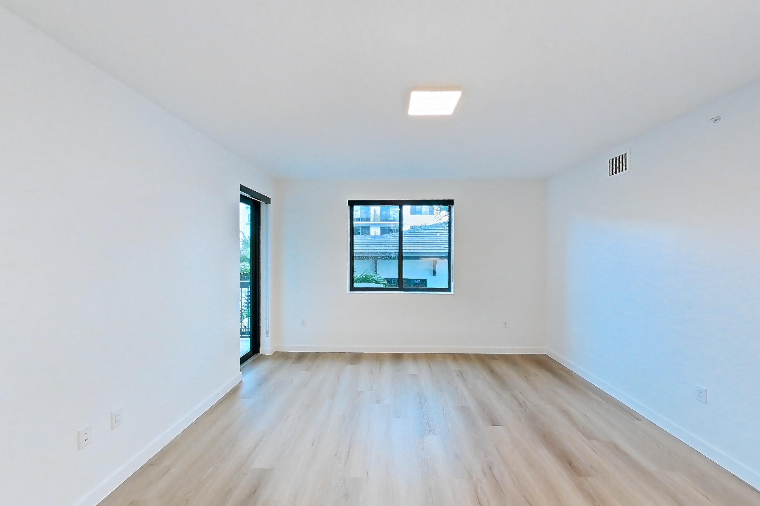 Kitchen island corner in Apartment 206 at Caroline Pompano Beach, C1 floor plan