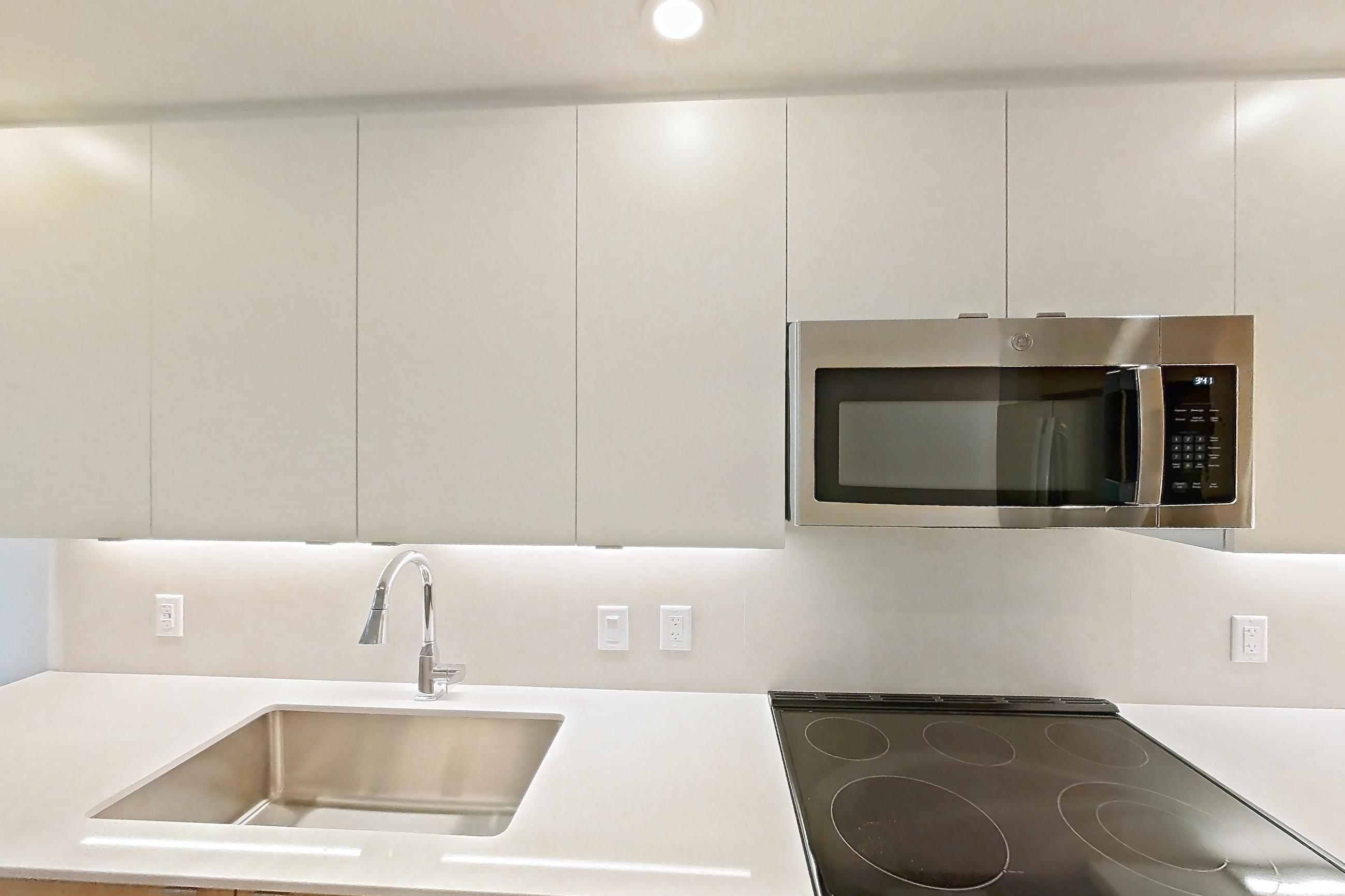 Kitchen in Apartment 206 at Caroline Pompano Beach, C1 floor plan