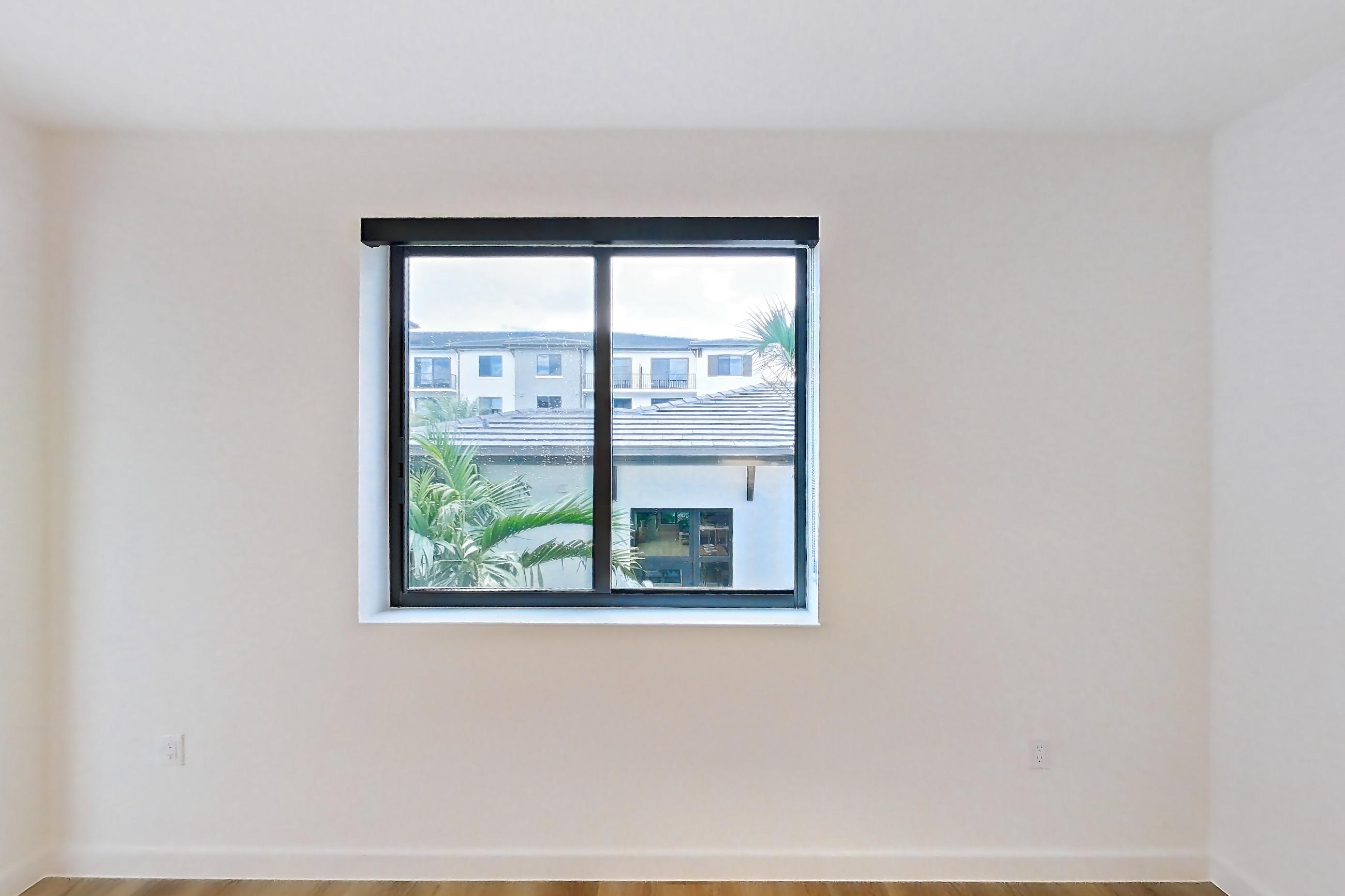Living room in Apartment 206 at Caroline Pompano Beach, C1 floor plan