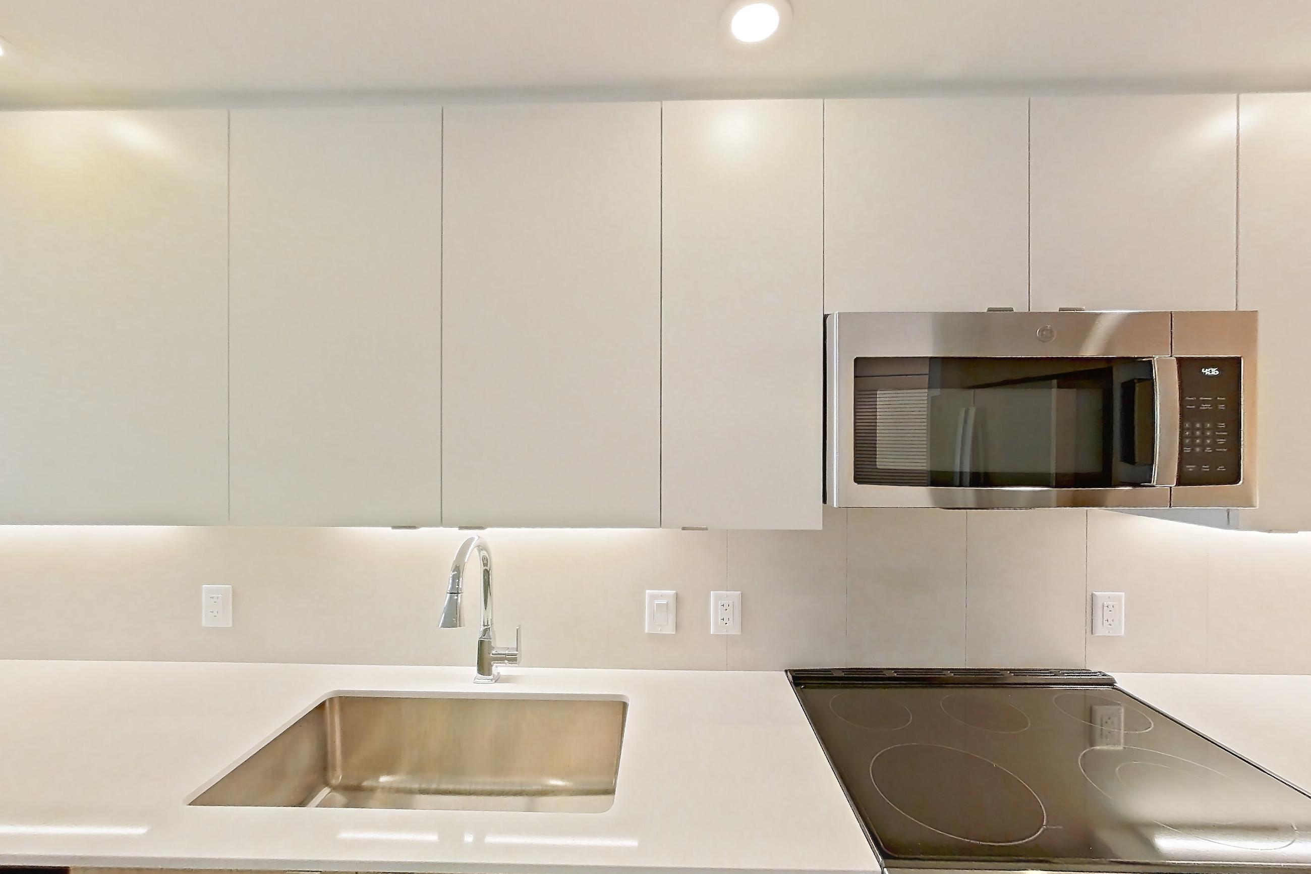 Kitchen in Apartment 207 at Caroline Pompano Beach, B2 floor plan