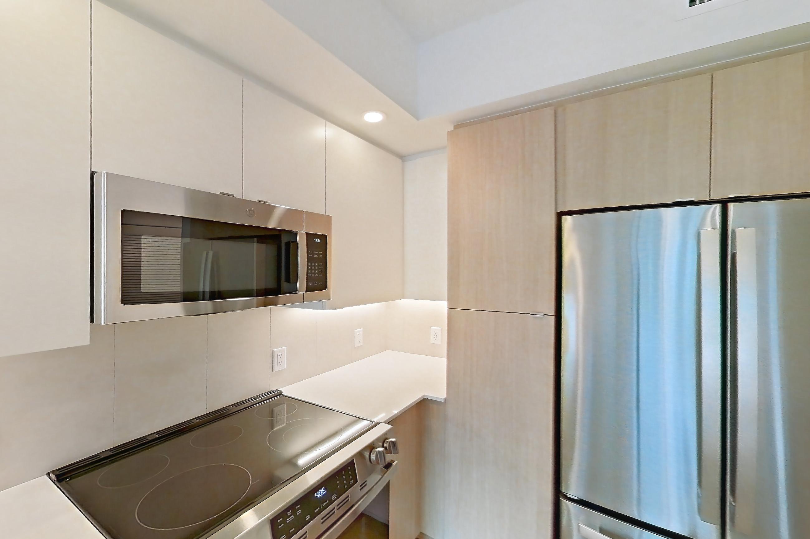 Kitchen in Apartment 207 at Caroline Pompano Beach, B2 floor plan