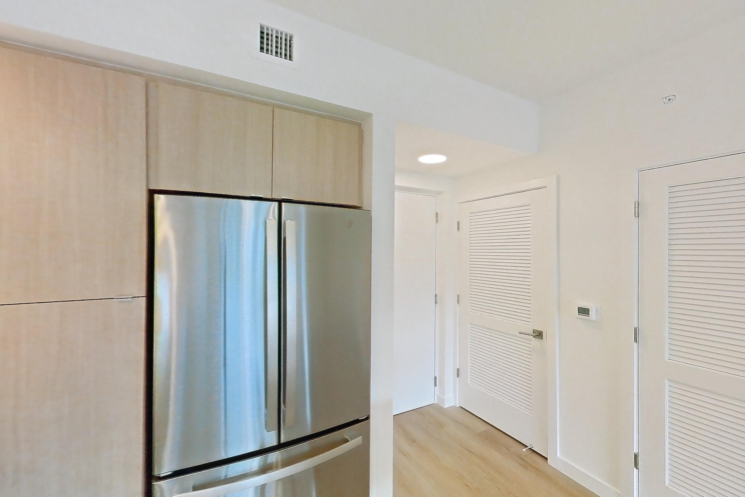 Kitchen in Apartment 207 at Caroline Pompano Beach, B2 floor plan