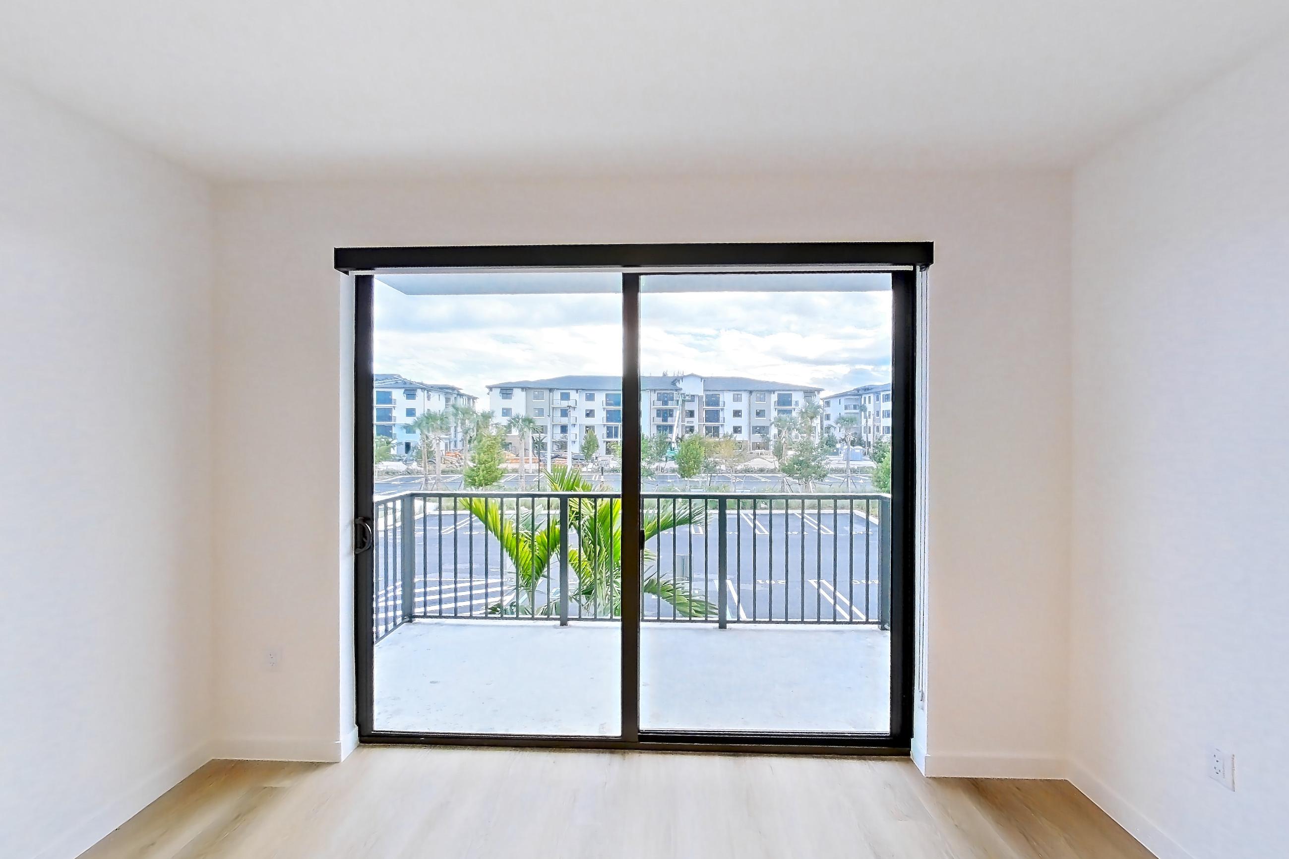 Living room in Apartment 207 at Caroline Pompano Beach, B2 floor plan
