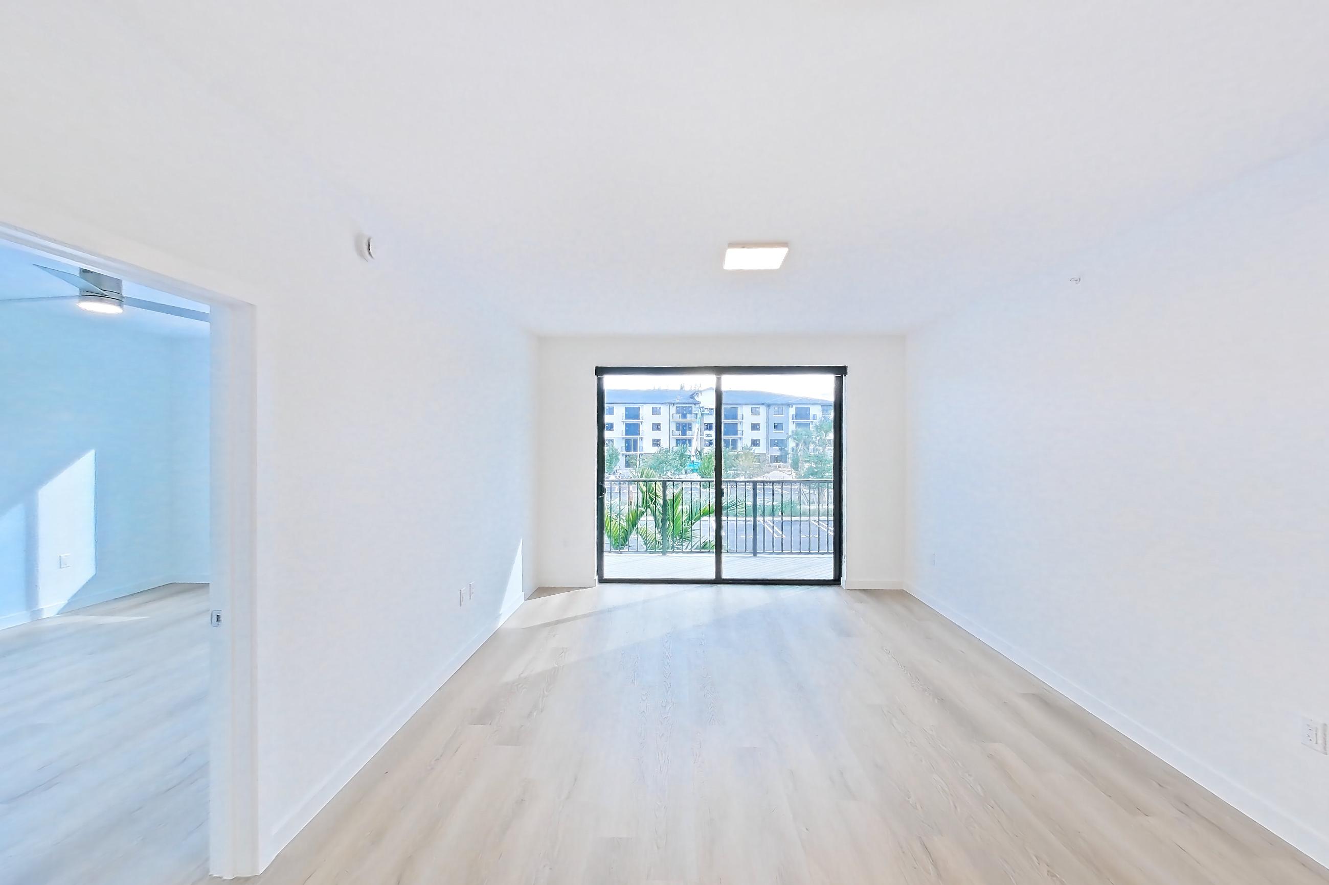 Living space in Apartment 207 at Caroline Pompano Beach, B2 floor plan