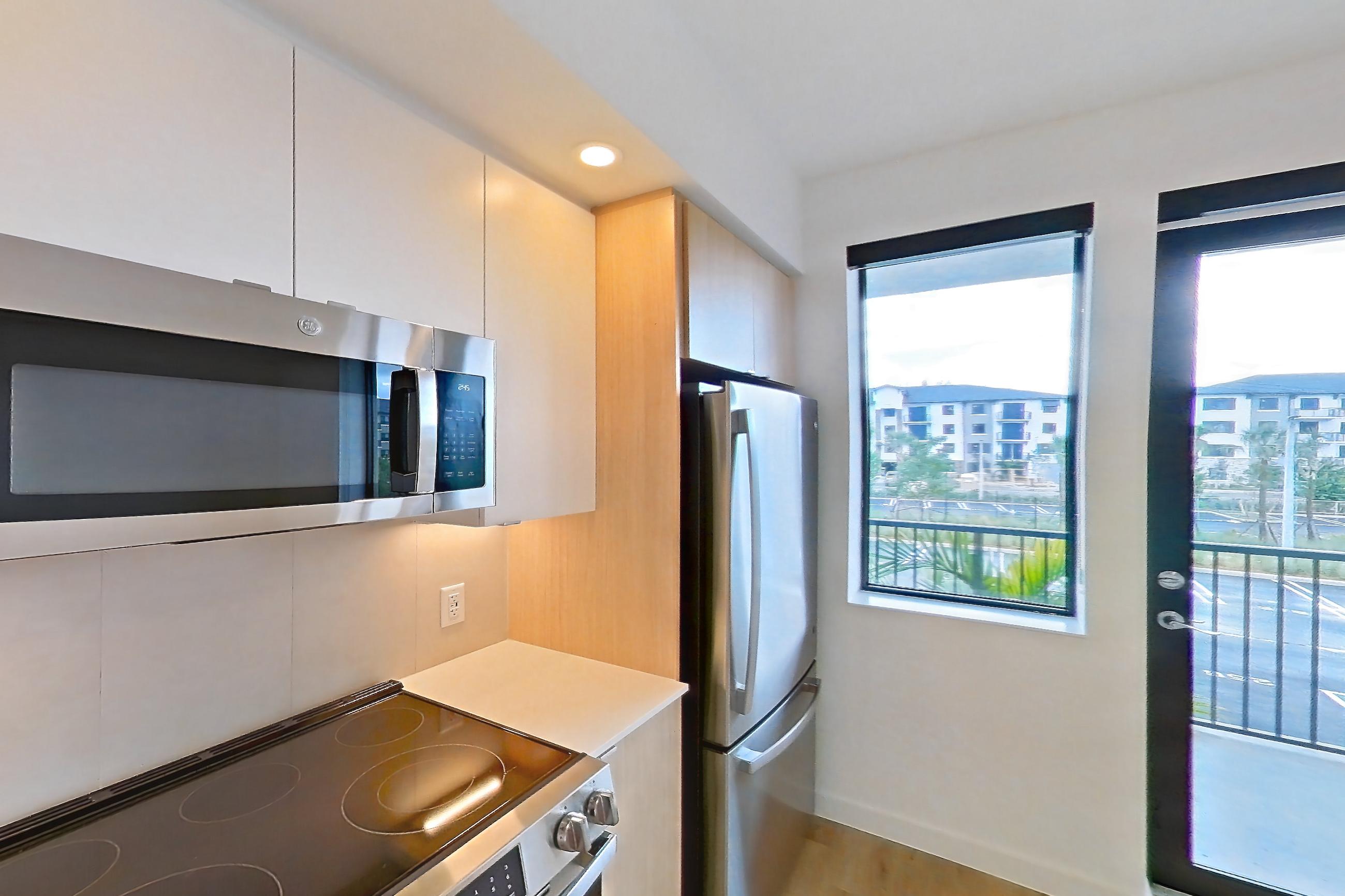 Kitchen in Apartment 209 at Caroline Pompano Beach, ST floor plan