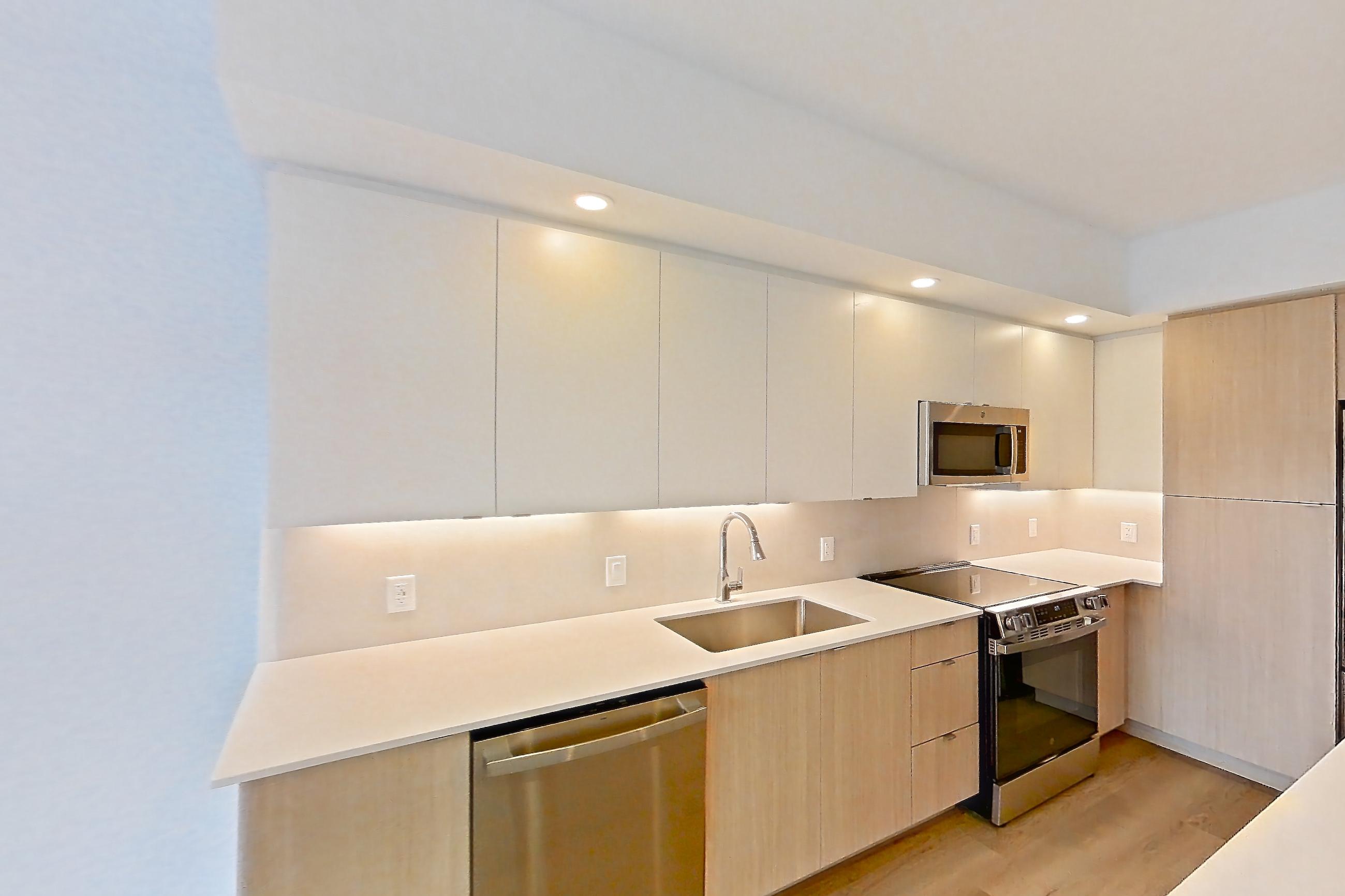 Kitchen island corner in Apartment 210 at Caroline Pompano Beach, A1.WF floor plan