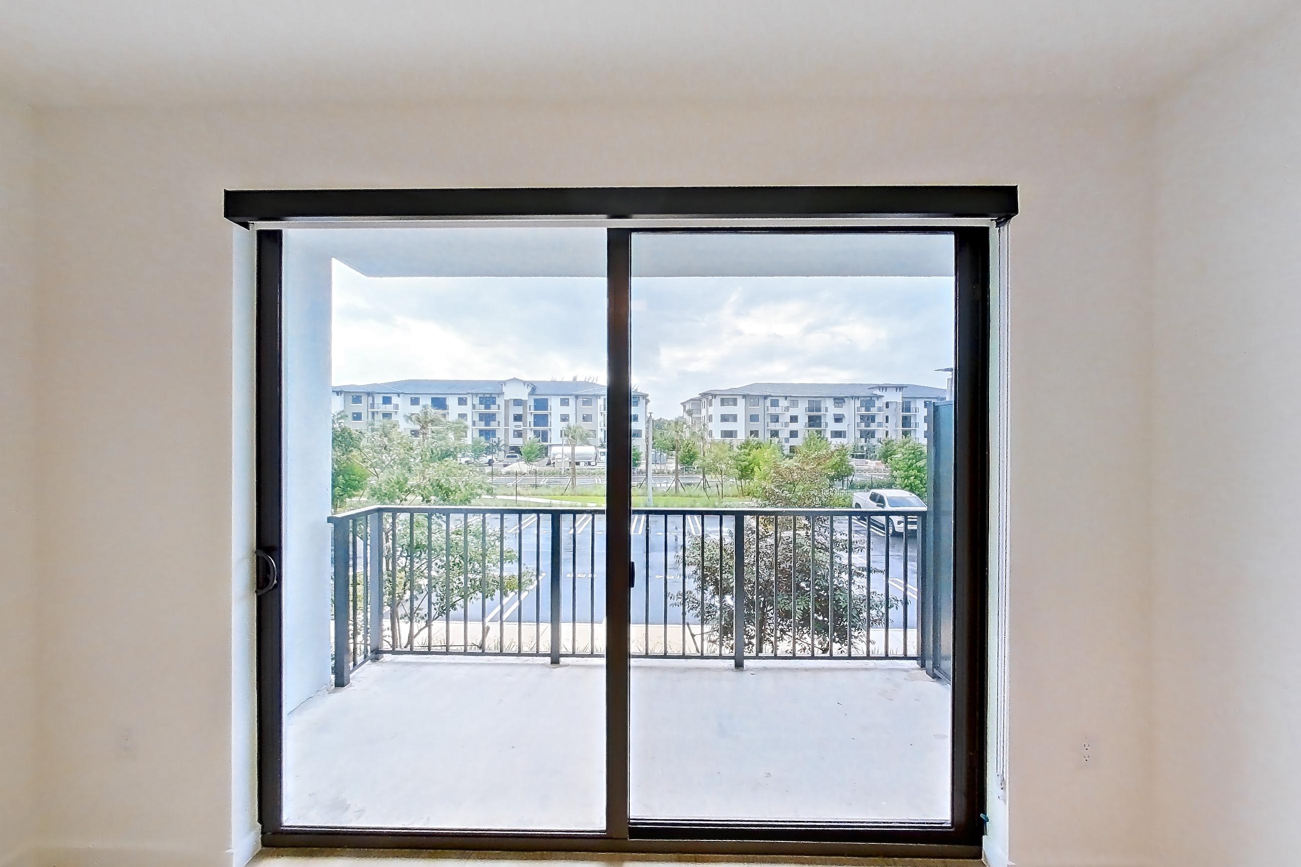 Living room in Apartment 210 at Caroline Pompano Beach, A1.WF floor plan