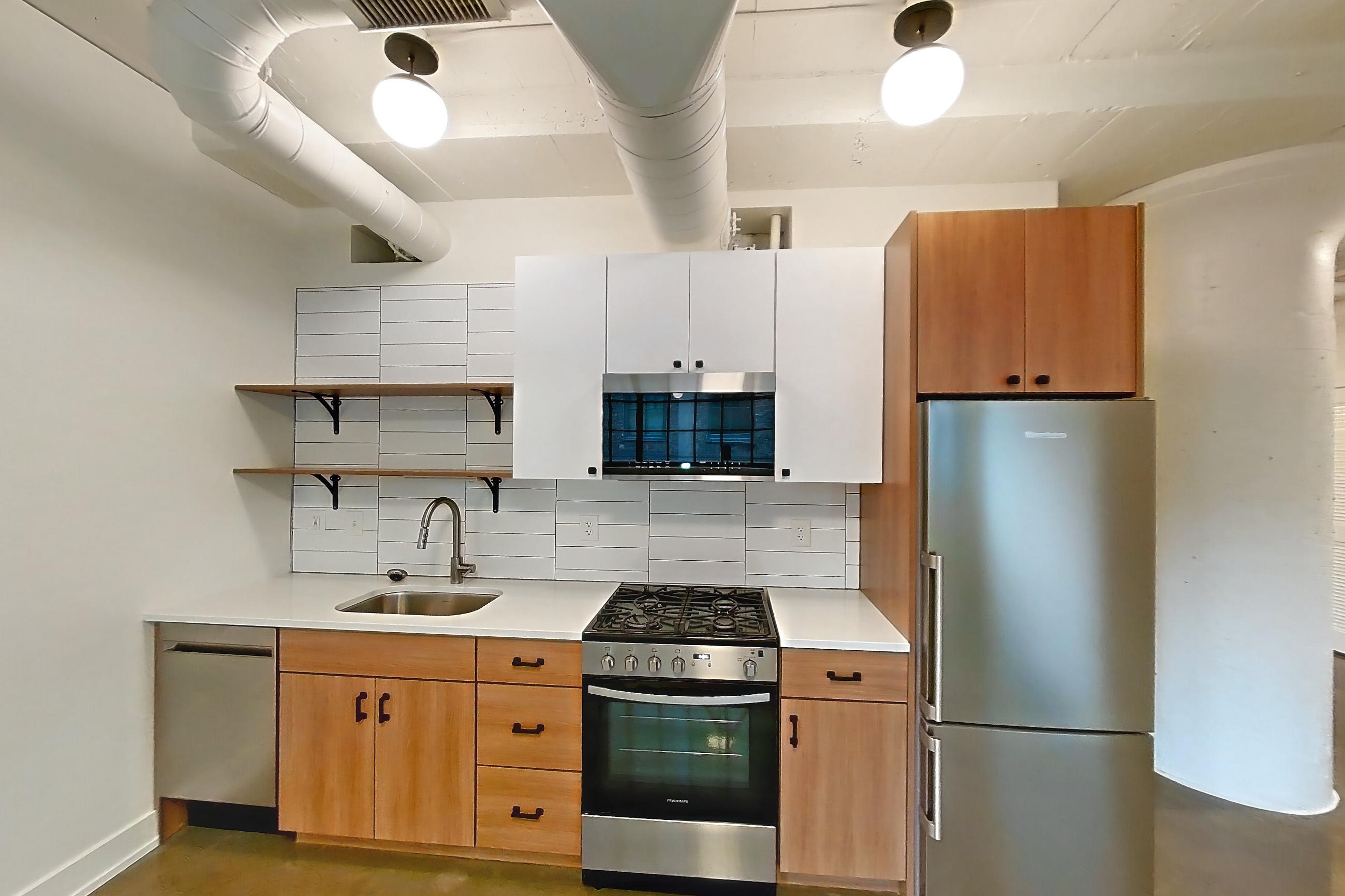 Living room and kitchen, Apartment 234 at The Hall Lofts