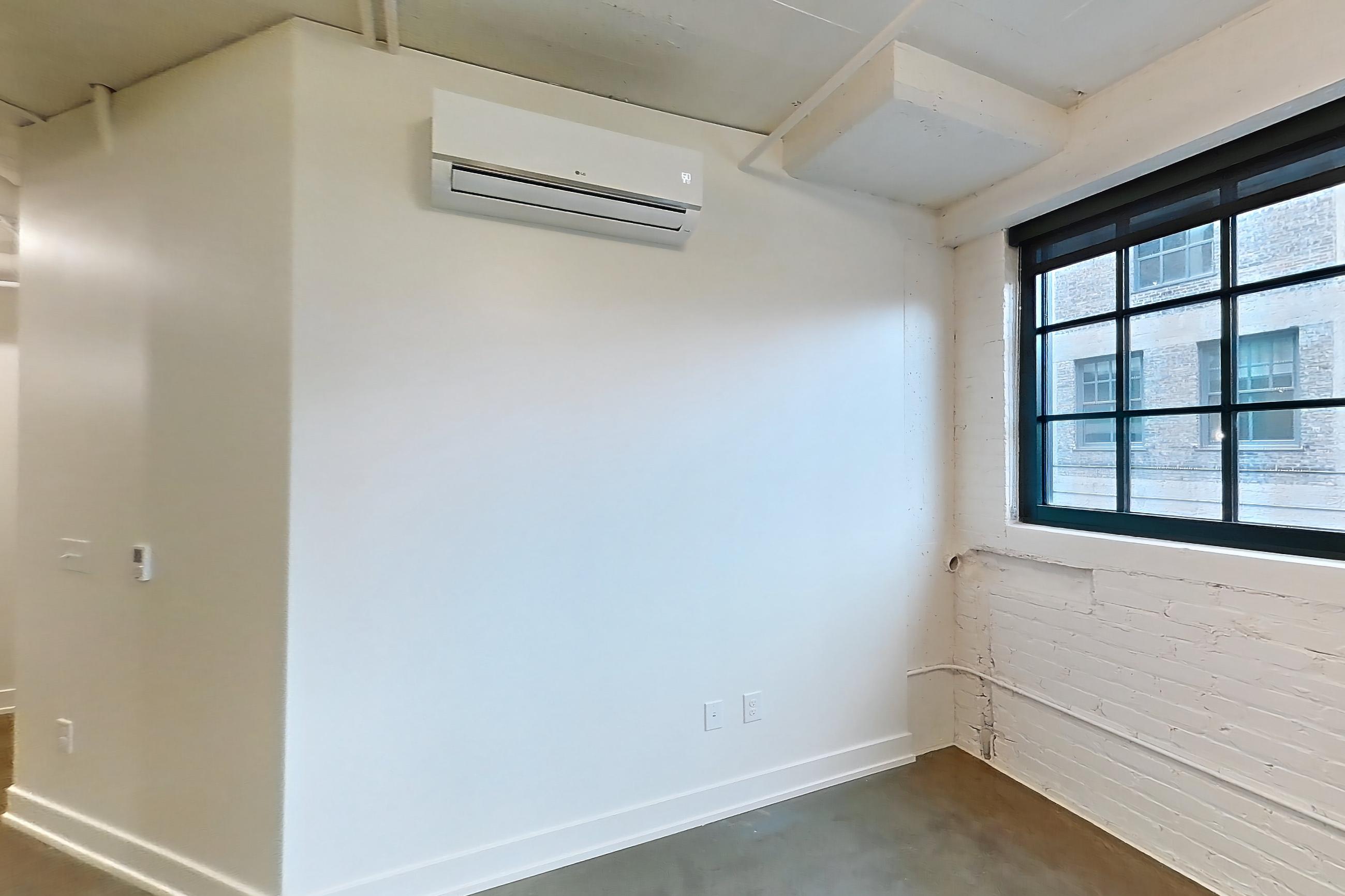 Living room and kitchen, Apartment 234 at The Hall Lofts