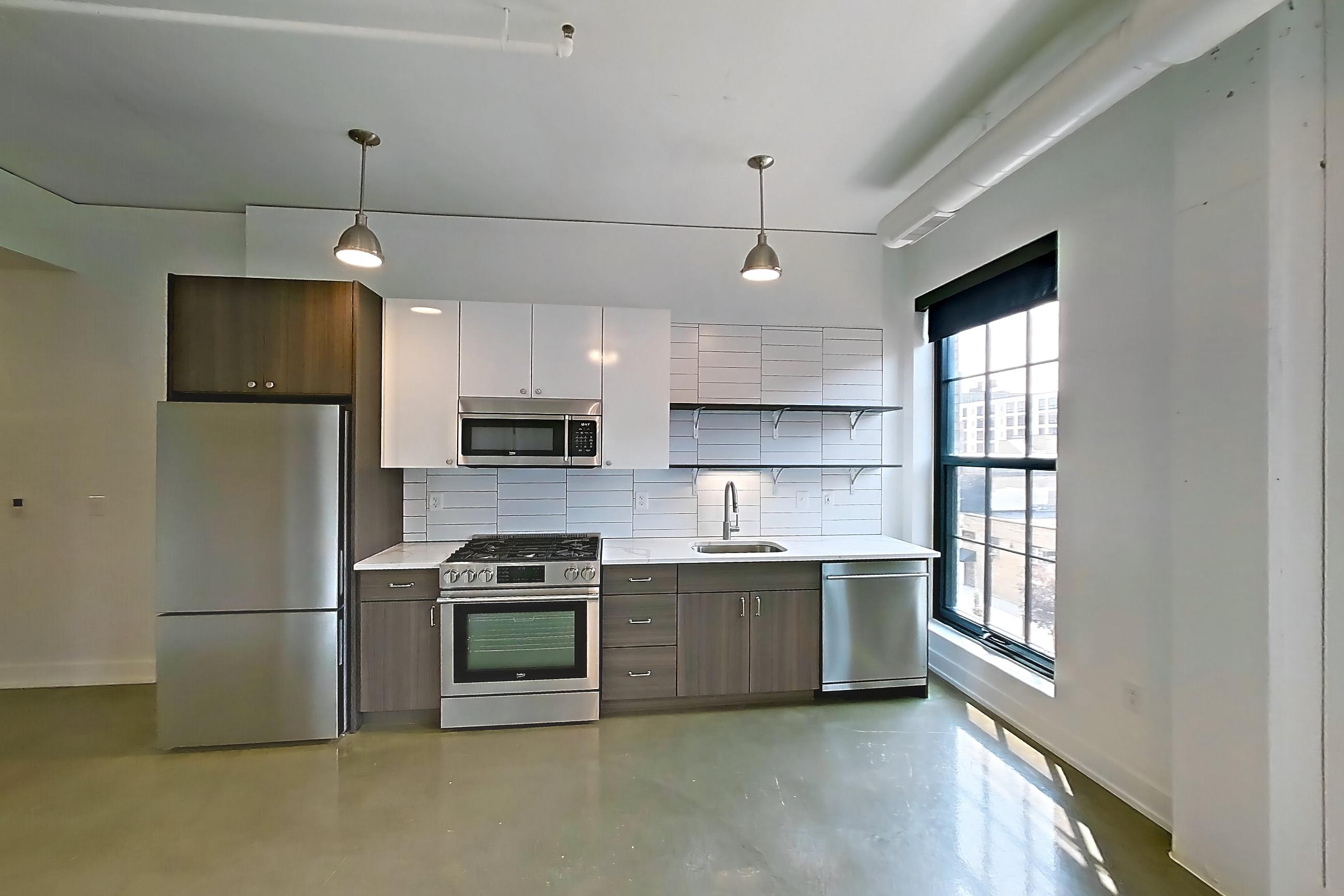 LIVING ROOM AND KITCHEN (representative of this floor plan)