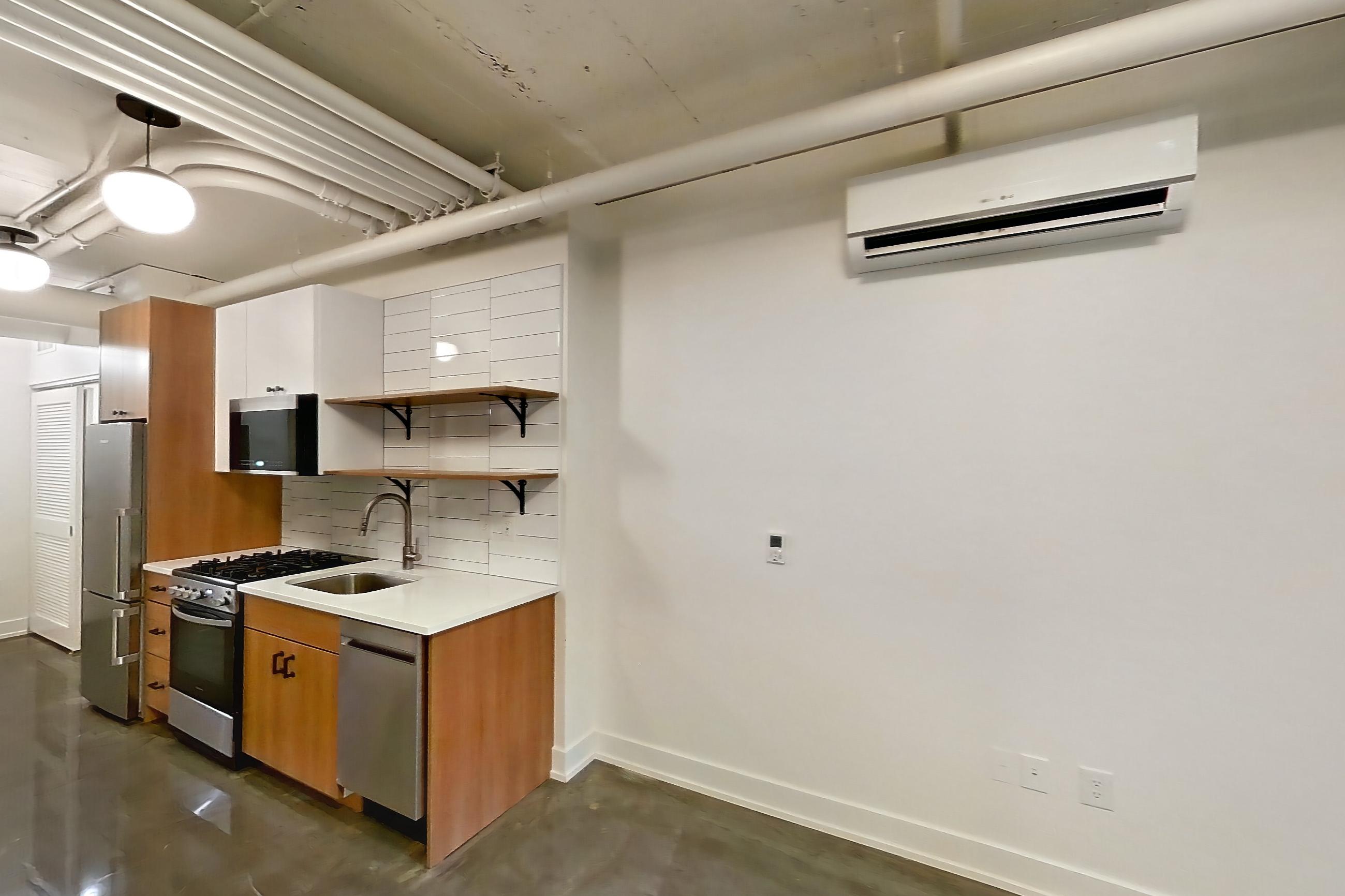 Living room, Apartment 542 at The Hall Lofts