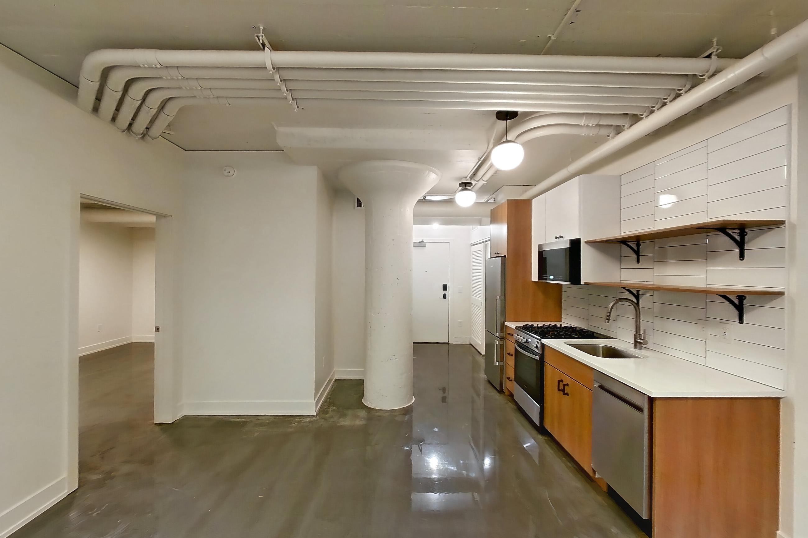 Living room in Apartment 542 at The Hall Lofts, B28 floor plan