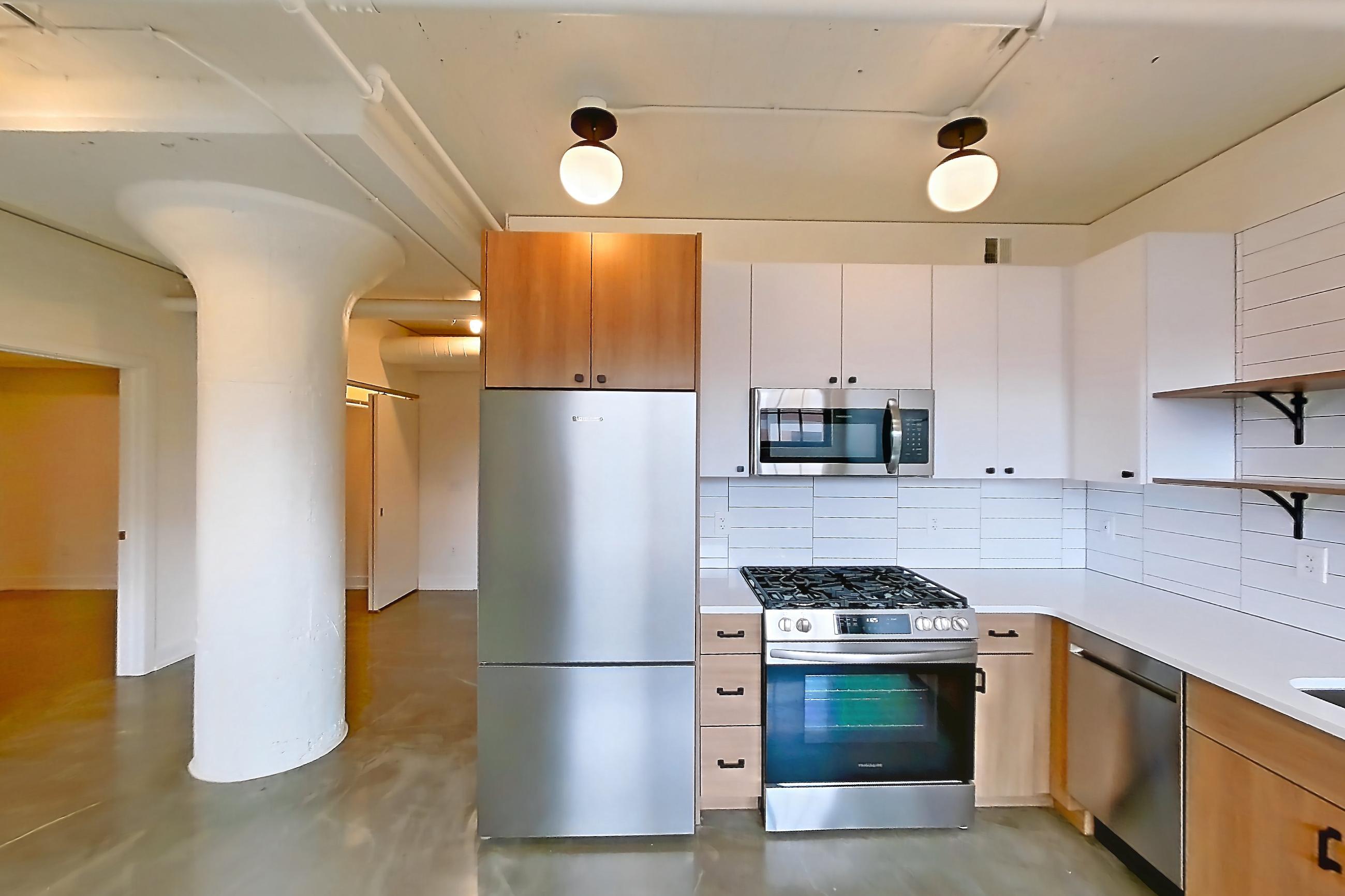LIVING ROOM AND KITCHEN (representative of this floor plan)