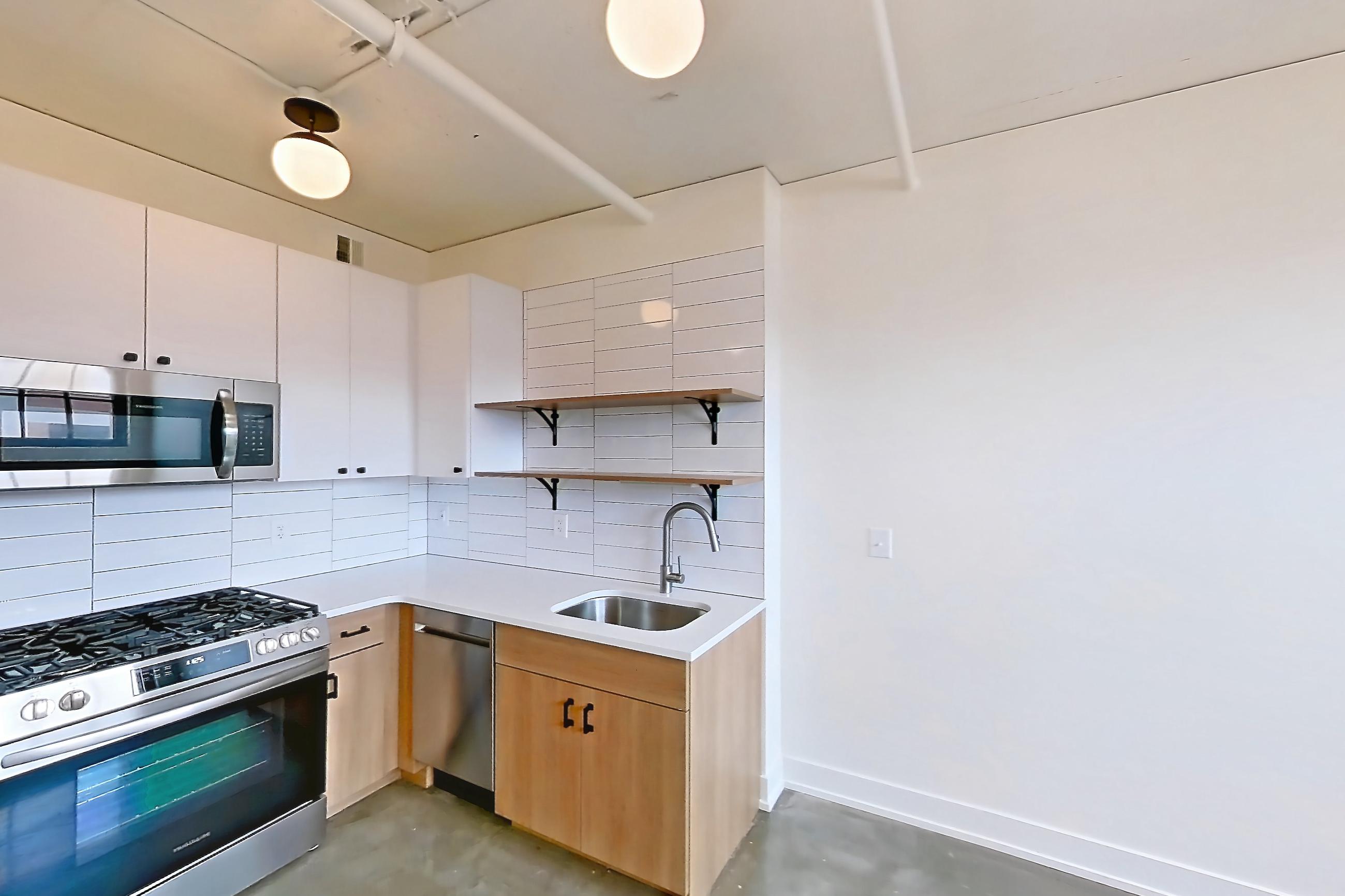 LIVING ROOM AND KITCHEN (representative of this floor plan)