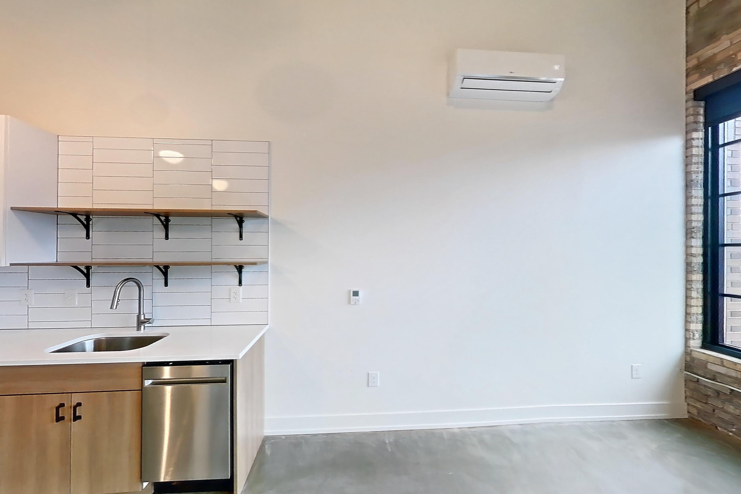 Living room and kitchen, Apartment 841 at The Hall Lofts