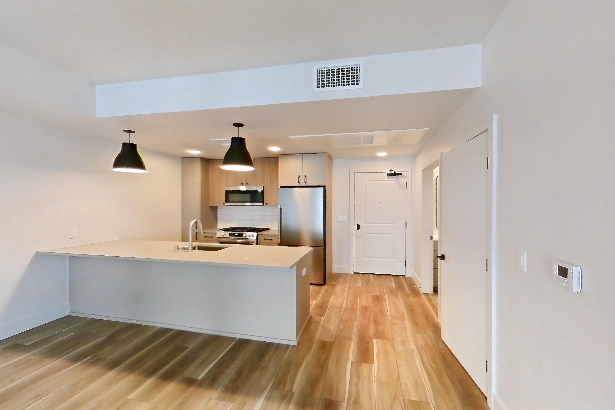 Living room, Apartment 504 at The Myles