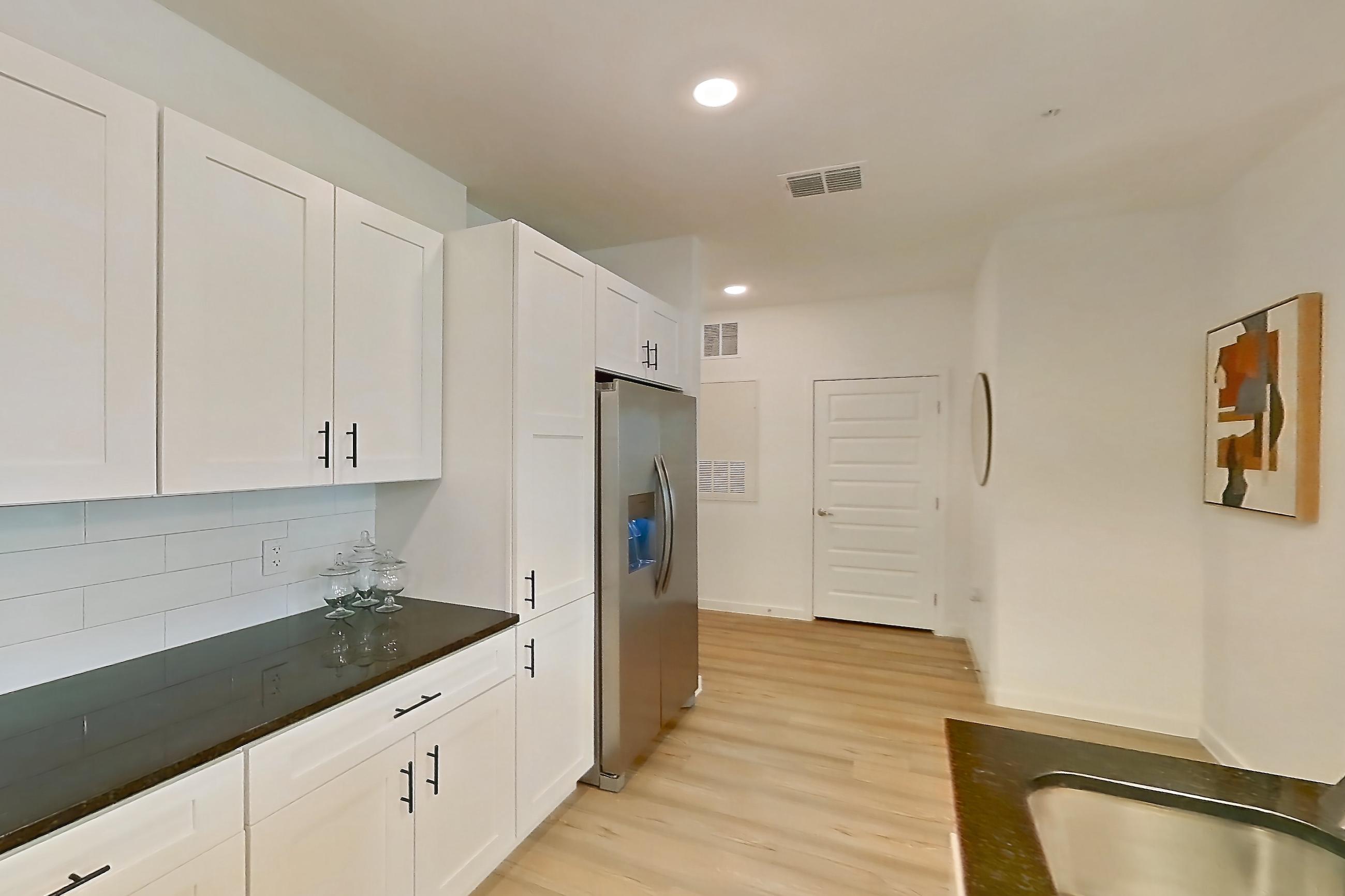 Kitchen in Apartment 4114-model at The Dahlia Luxury Apartments, 2X2B JADE floor plan