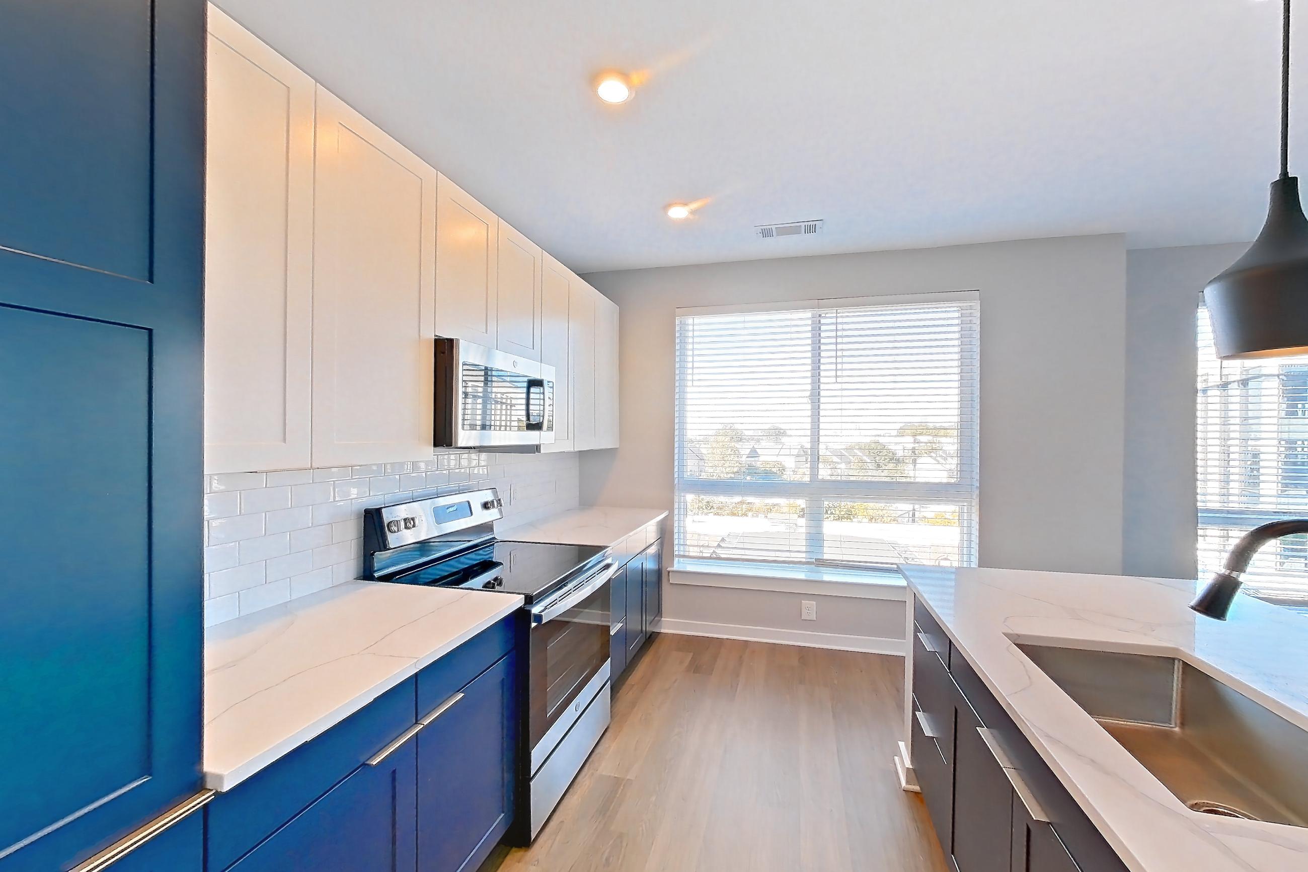 Kitchen in Apartment 615 at The Rowe at Commonwealth, C7.1 floor plan