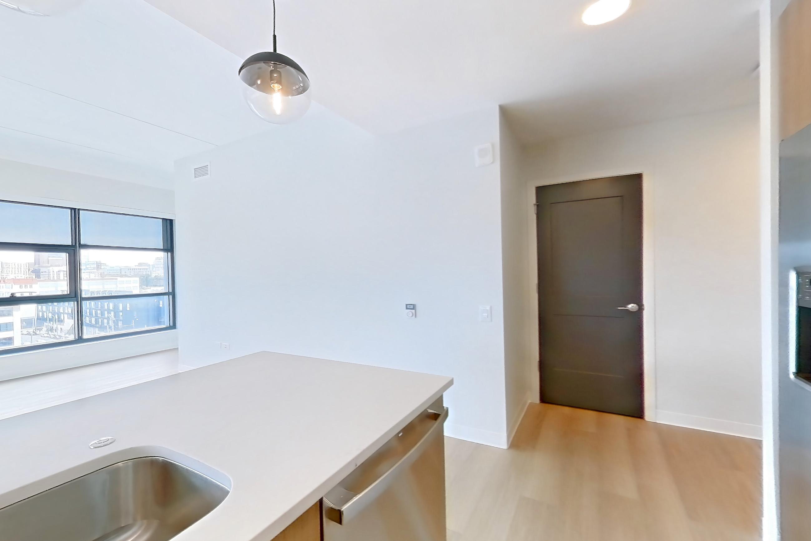 Kitchen in Apartment 0702 at The Alcott, B3 floor plan