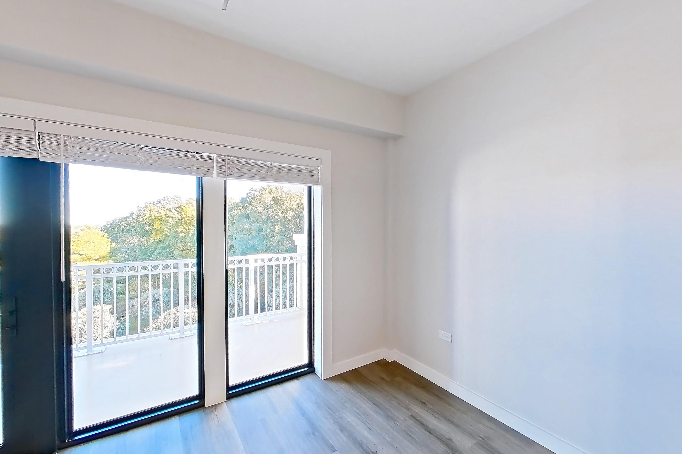 Living space with dark wood-finish flooring and light wood-finish flooring, Apartment S306 at Carlow Wind Watch