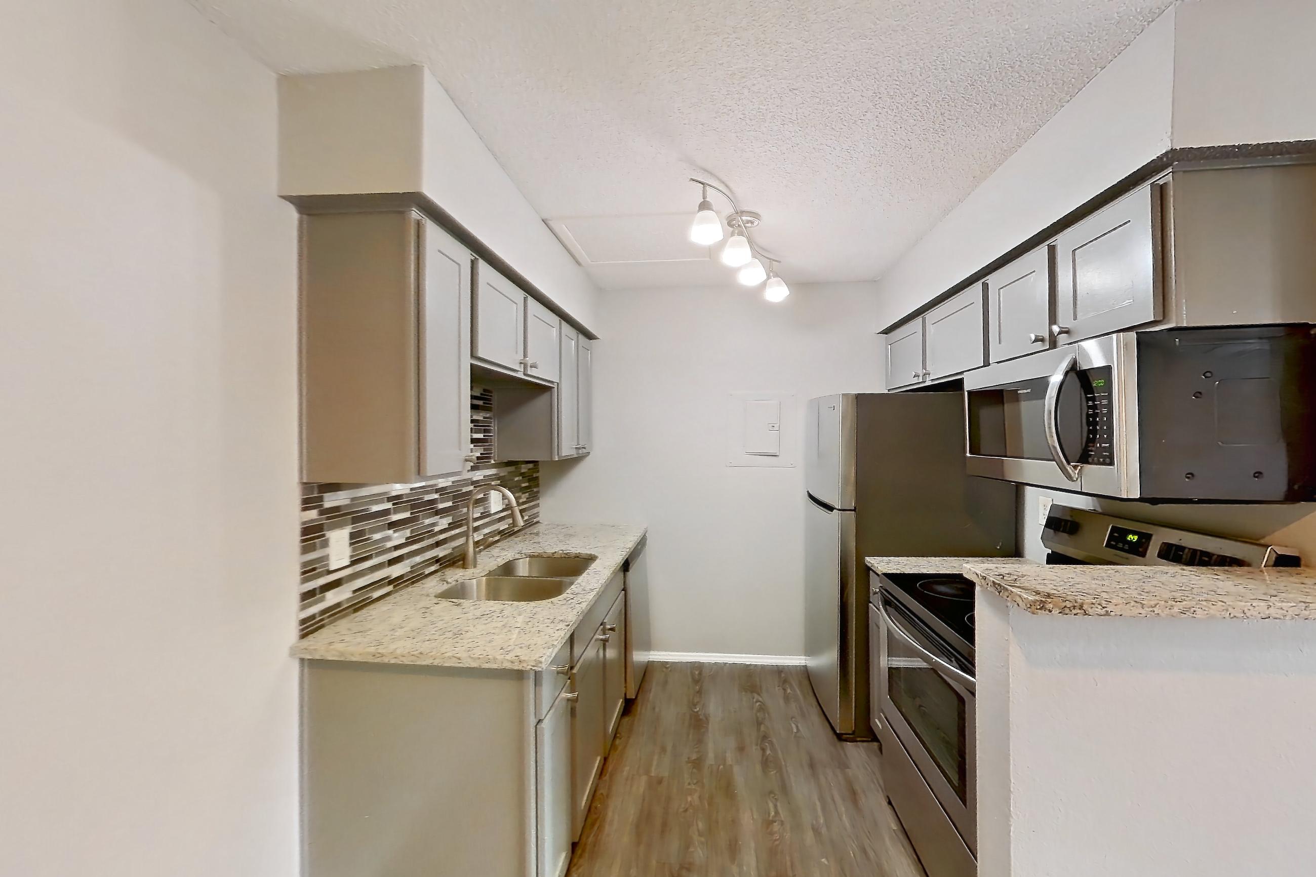 Dining room in Apartment 608 at Marine Creek Apartments, A floor plan