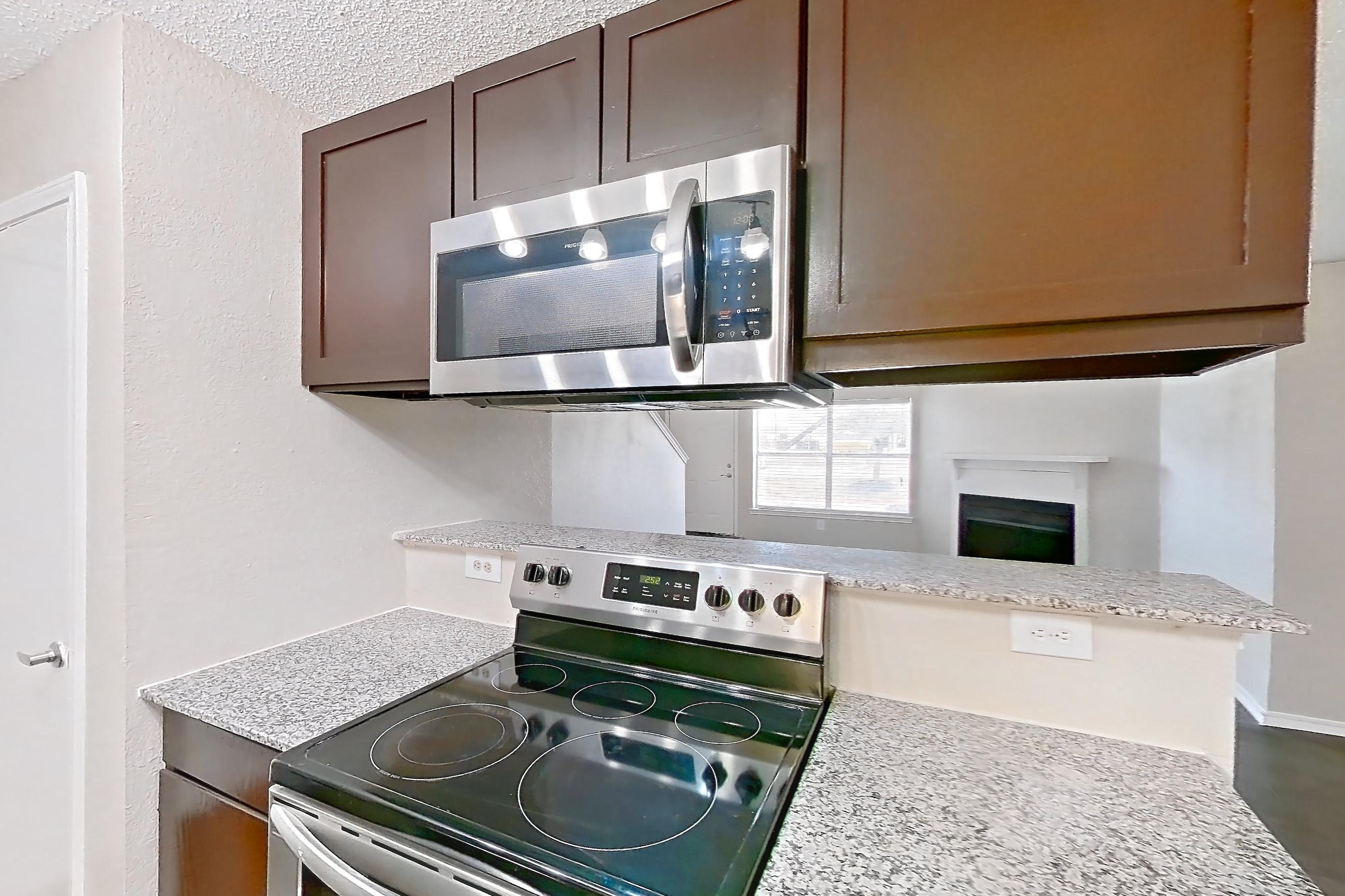 Kitchen in Apartment 103 at Quail Ridge Apartments, L-1 floor plan