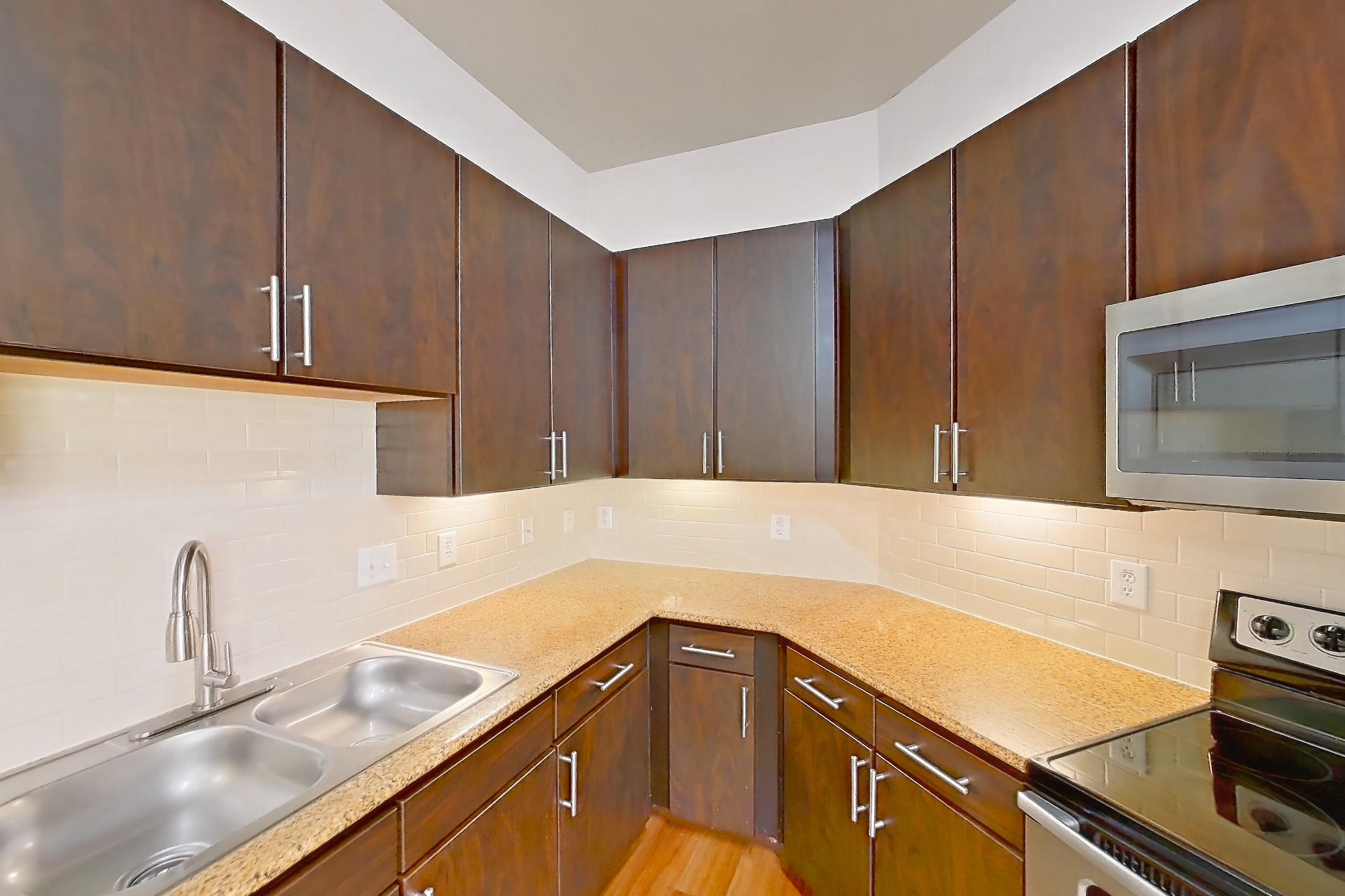 Kitchen in Apartment 371 at Voyager at the Space Center, A07 - The Glenn floor plan