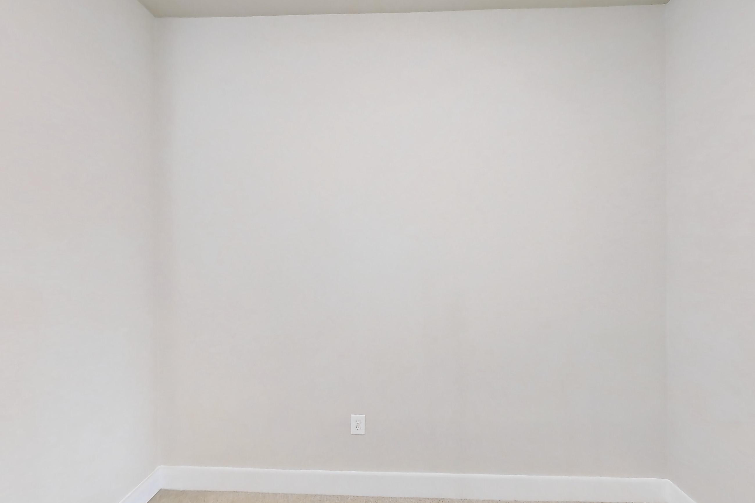 Dining room with electric range, light stone countertops, oven/range, refrigerator, stainless steel appliances, and water & ice dispenser, Apartment 444 at Voyager at the Space Center