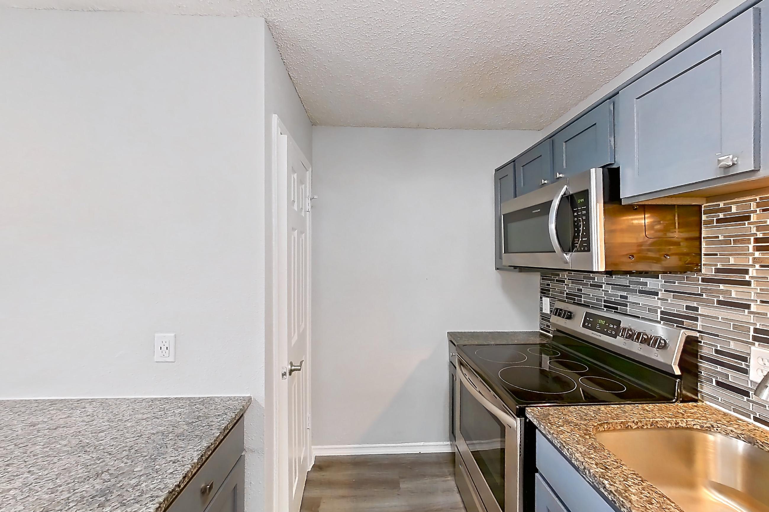 Kitchen in Apartment 509 at Quail Ridge Apartments, A-1 floor plan