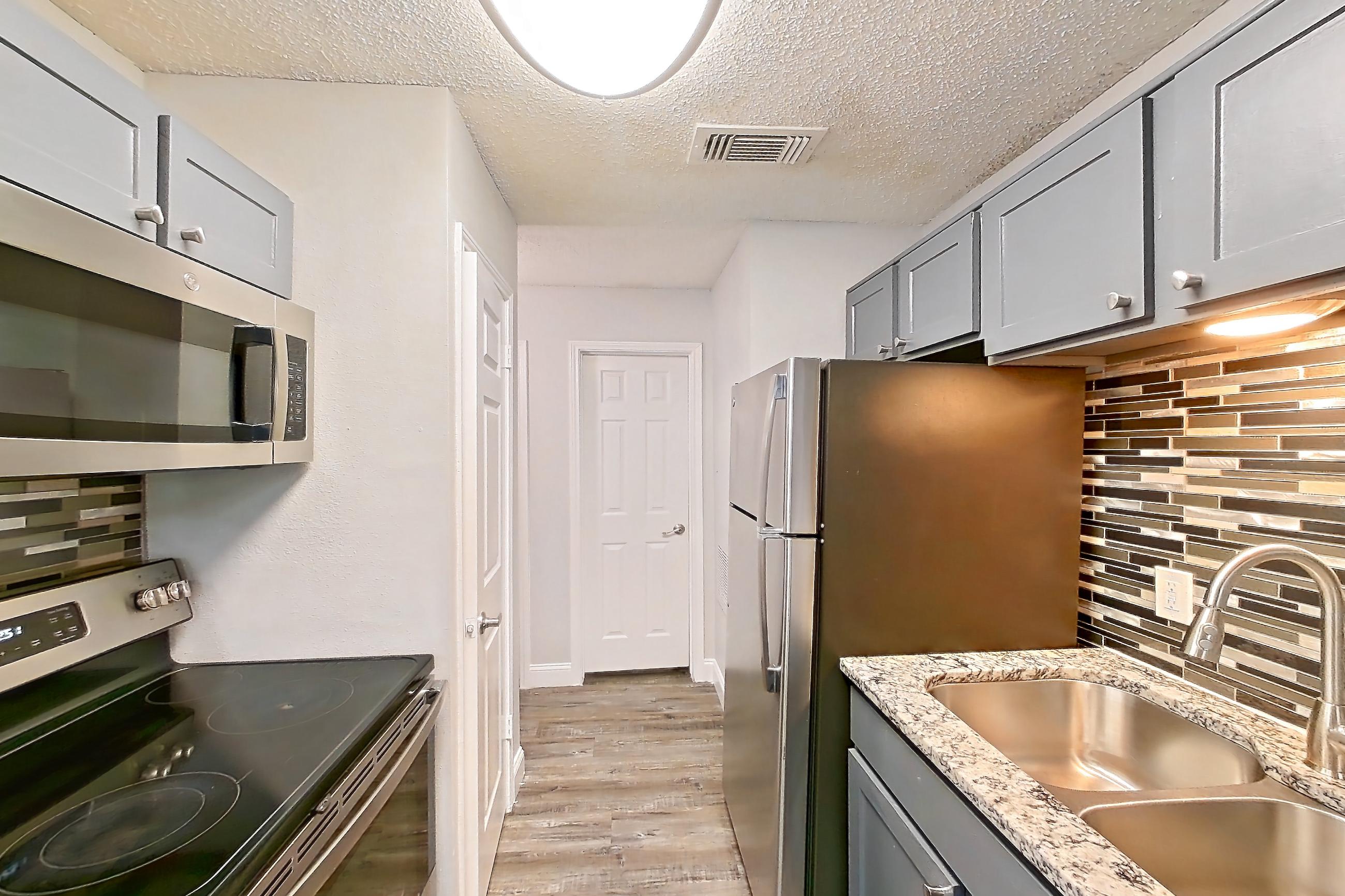 Kitchen in Apartment 811 at Quail Ridge Apartments, A-2 floor plan