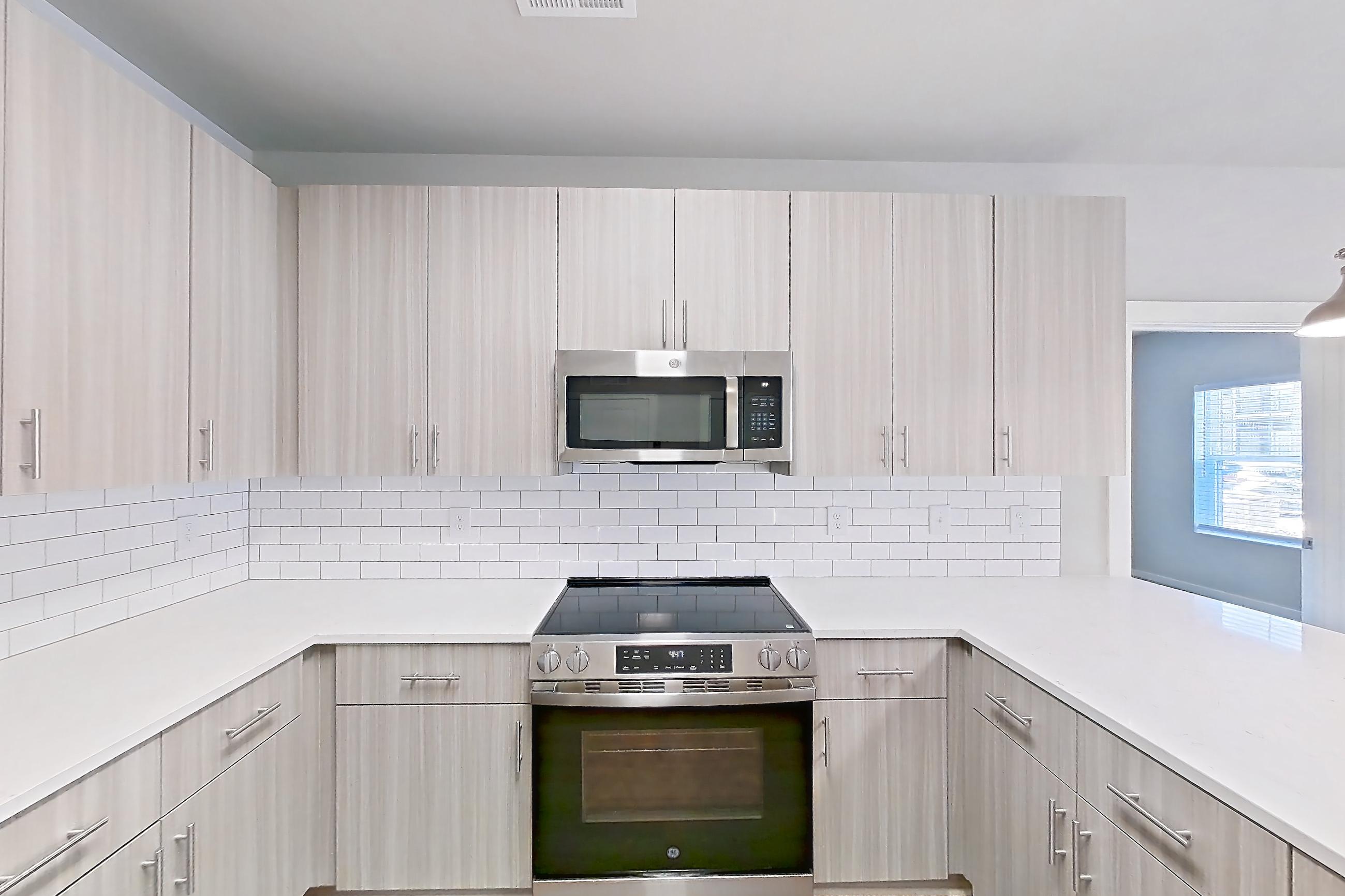 Kitchen in Apartment 2-100 at The Soho, Sapphire floor plan
