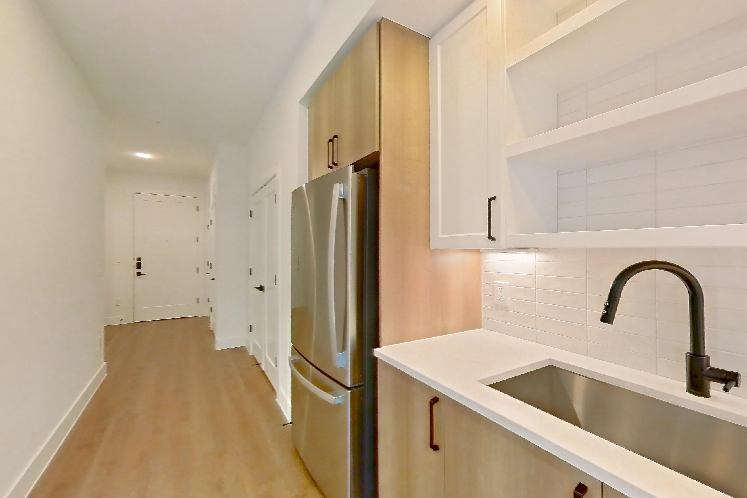 Kitchen in Apartment 405 at The Watson, S3.1WF floor plan