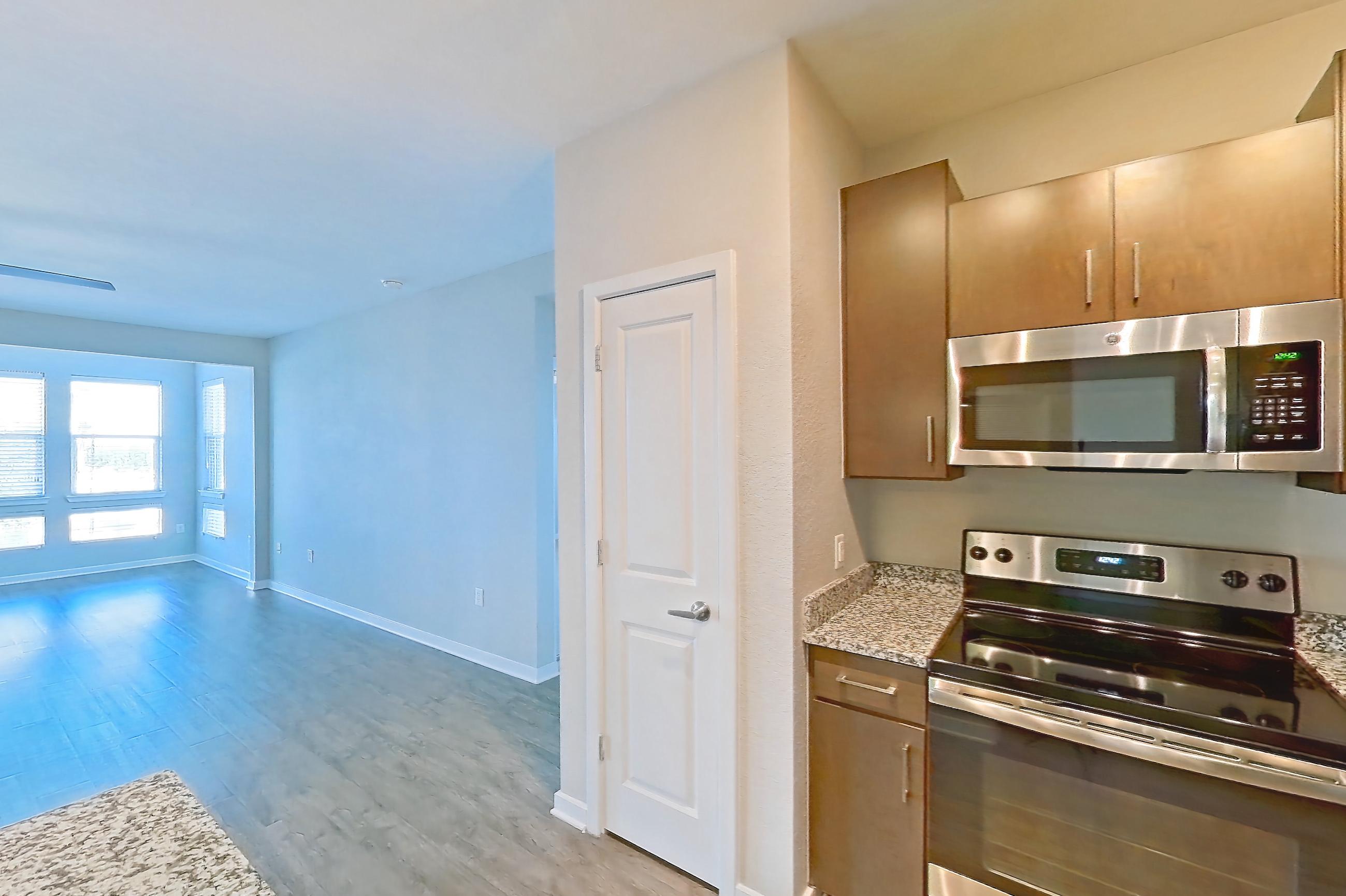 Kitchen in Apartment 301 at Lake Nona Ariel Apartments, Willow floor plan