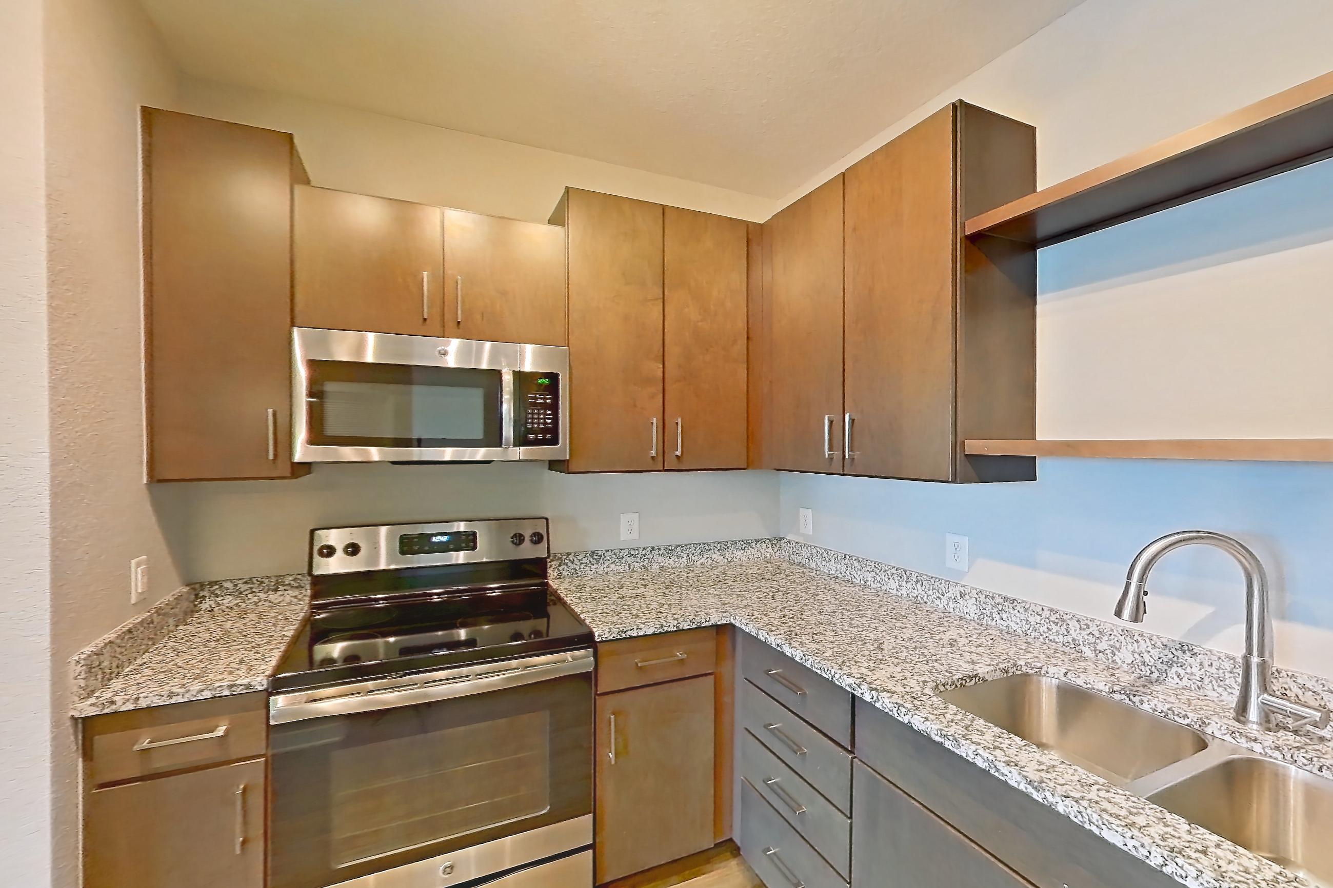 Kitchen in Apartment 301 at Lake Nona Ariel Apartments, Willow floor plan