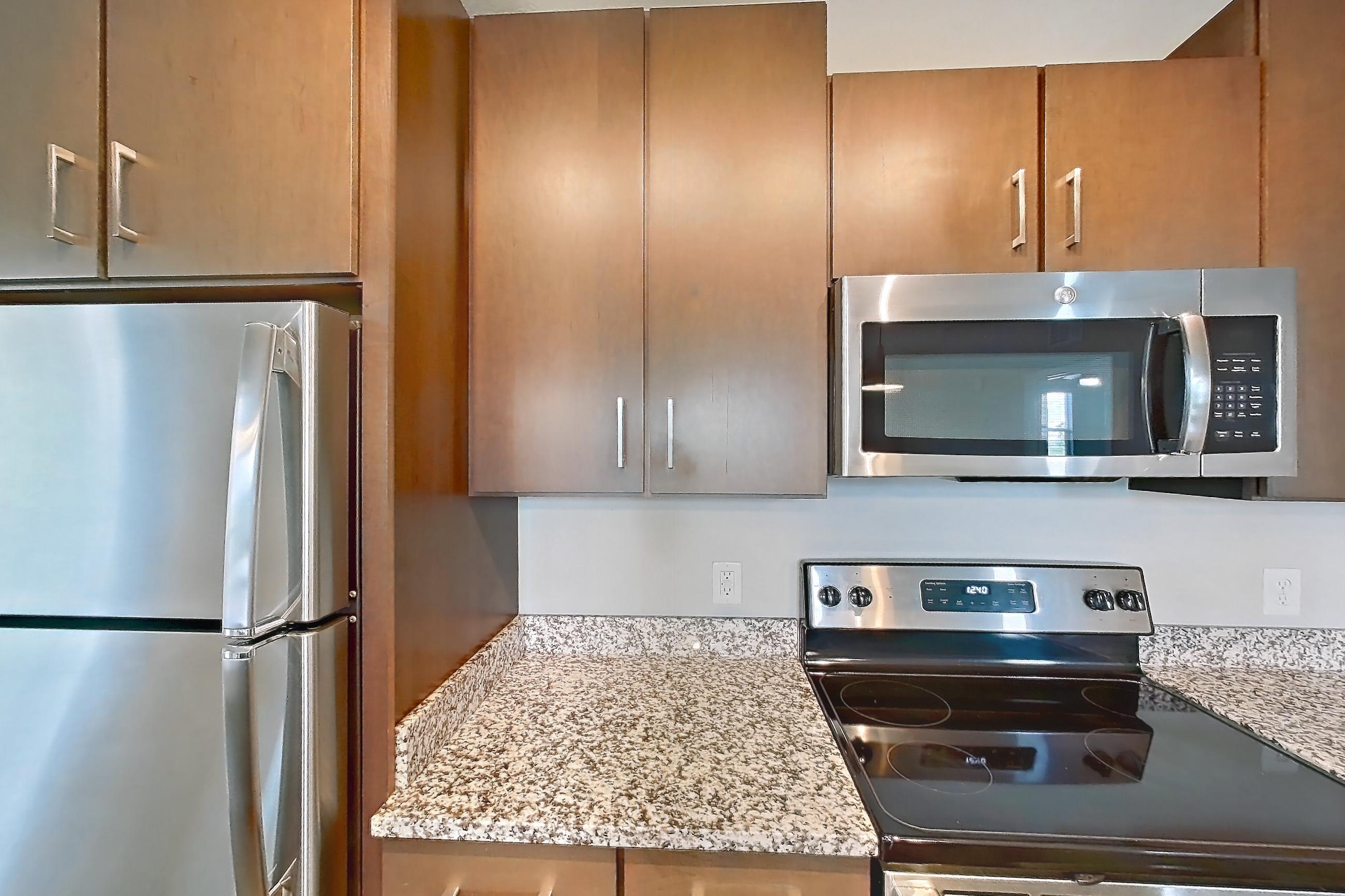 Kitchen in Apartment 201 at Lake Nona Ariel Apartments, Aster floor plan