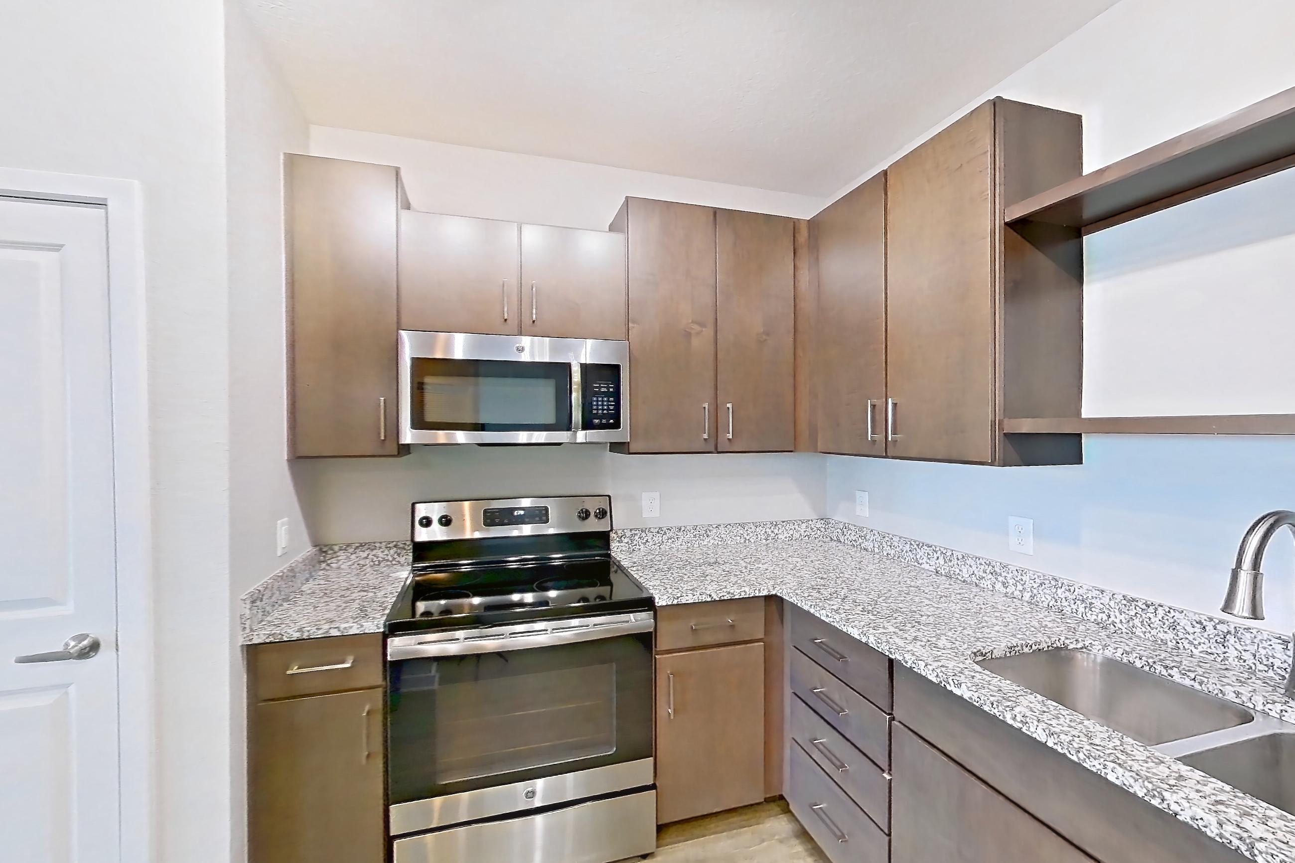 Kitchen in Apartment 305 at Lake Nona Ariel Apartments, Hawthorne floor plan