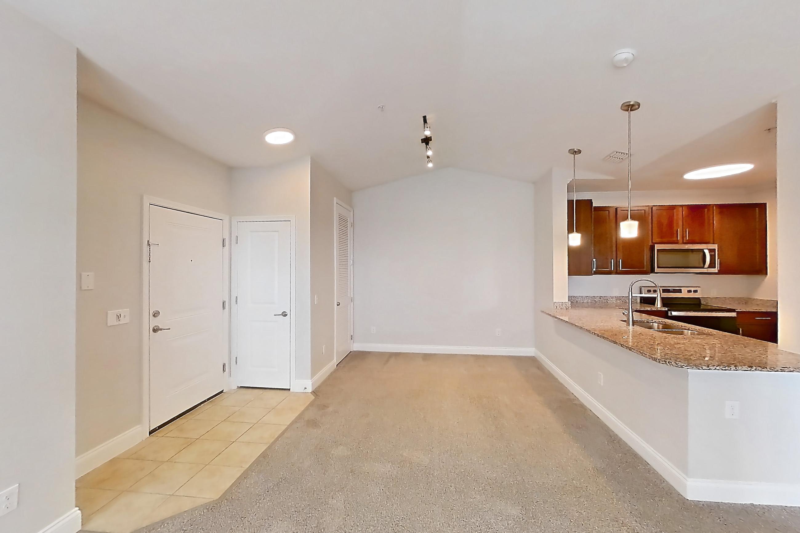 Living room, Apartment 0132 at Lake Nona Water Mark