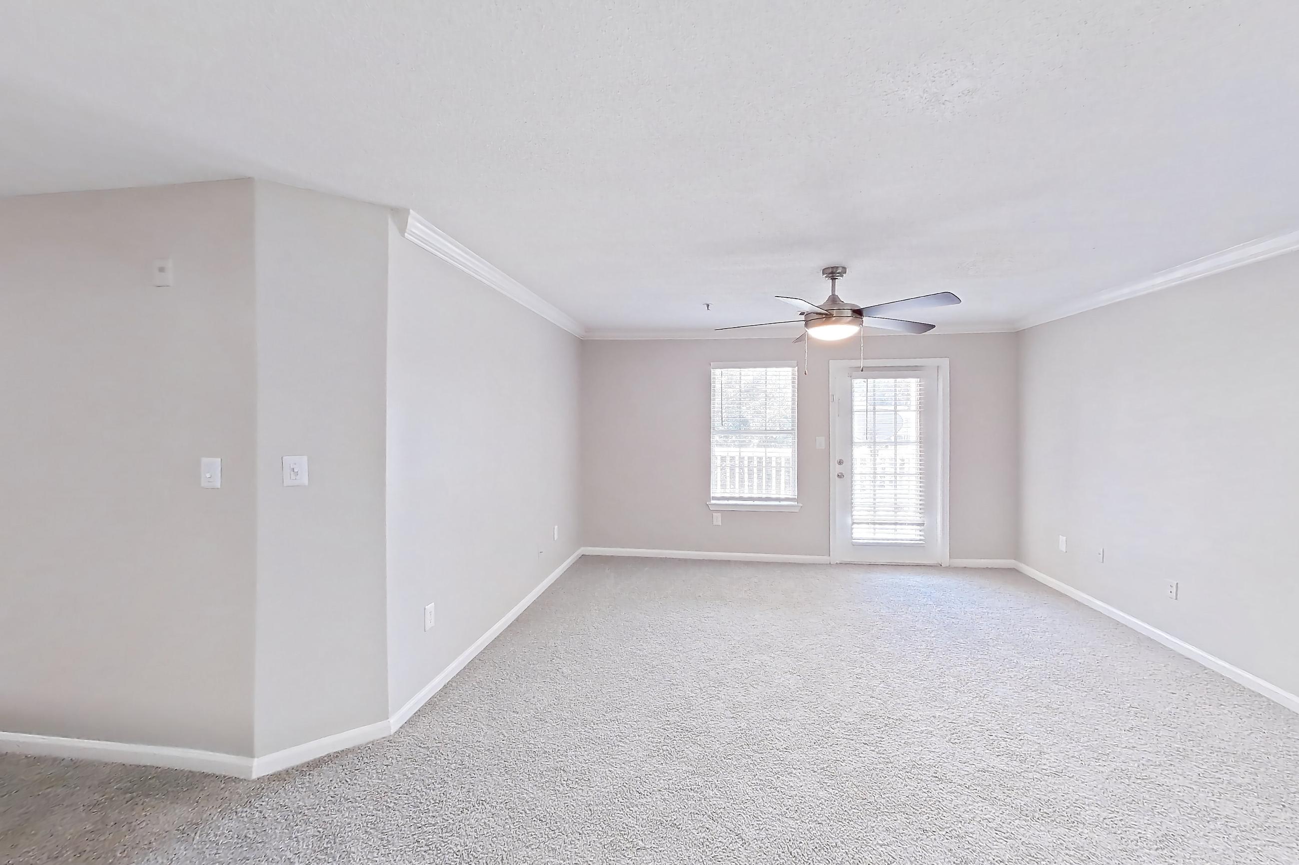Dining room with black appliances, electric range, light carpet, light countertops, oven/range, and refrigerator, Apartment 527 at Walden Landing