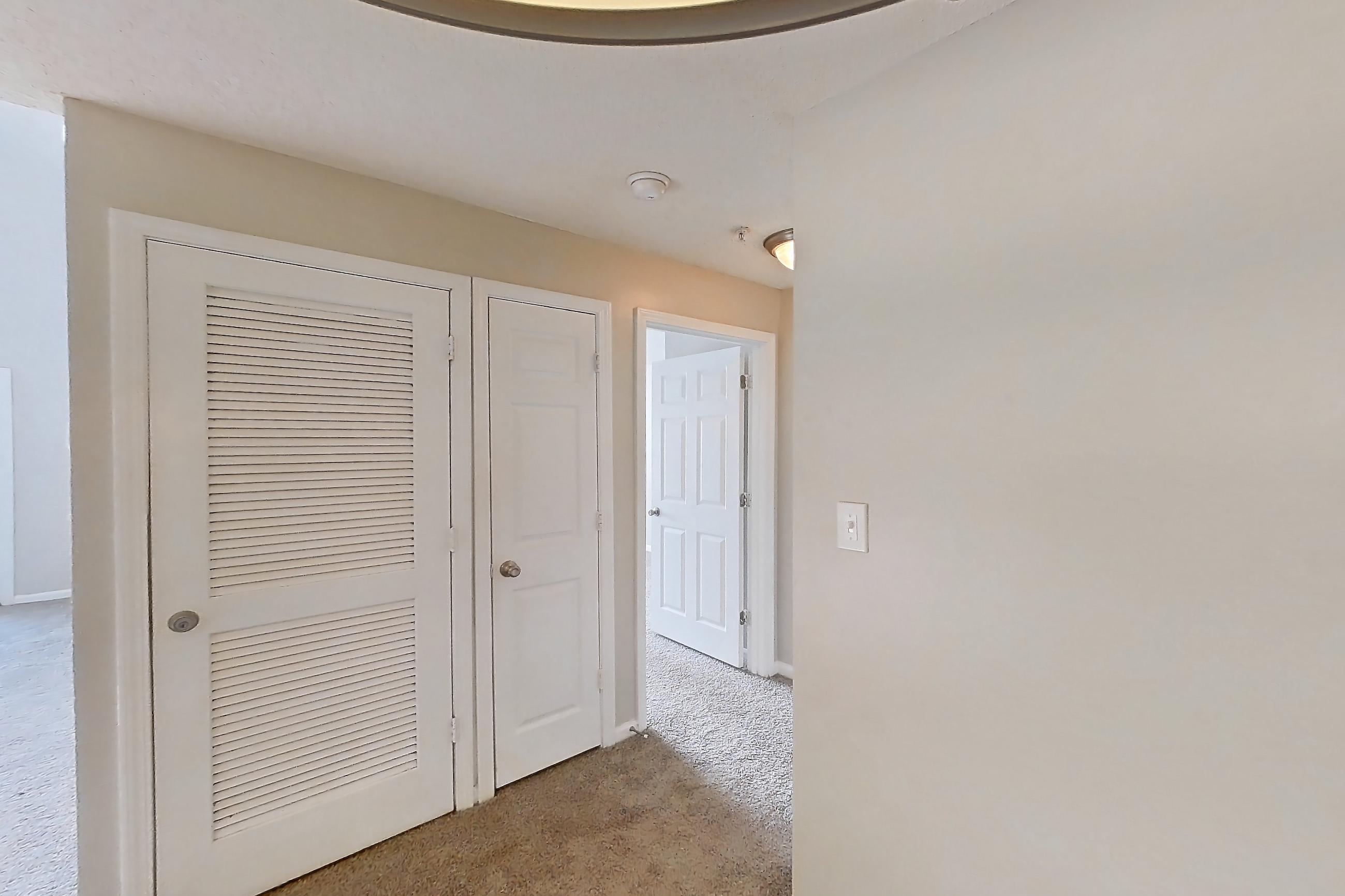 Dining room with light carpet and light stone countertops, Apartment 533 at Walden Landing
