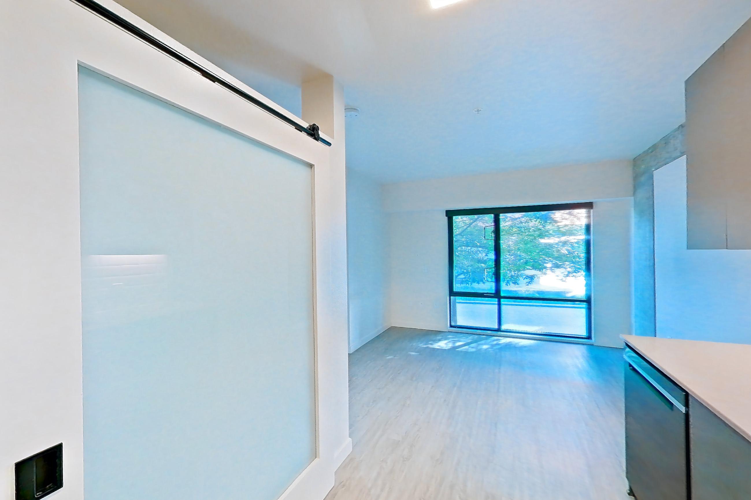 Kitchen in a U1 floor plan unit, representative of Unit 413W at Chroma