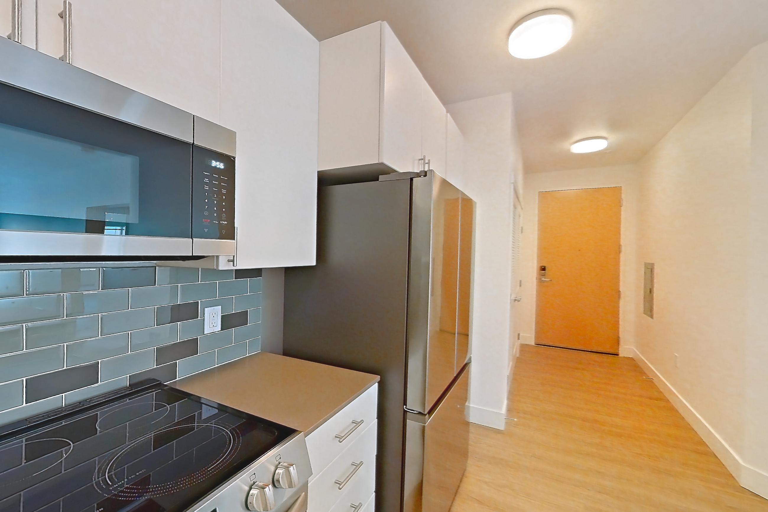 Kitchen in a A13 floor plan unit, representative of Unit 343 at The Waymark