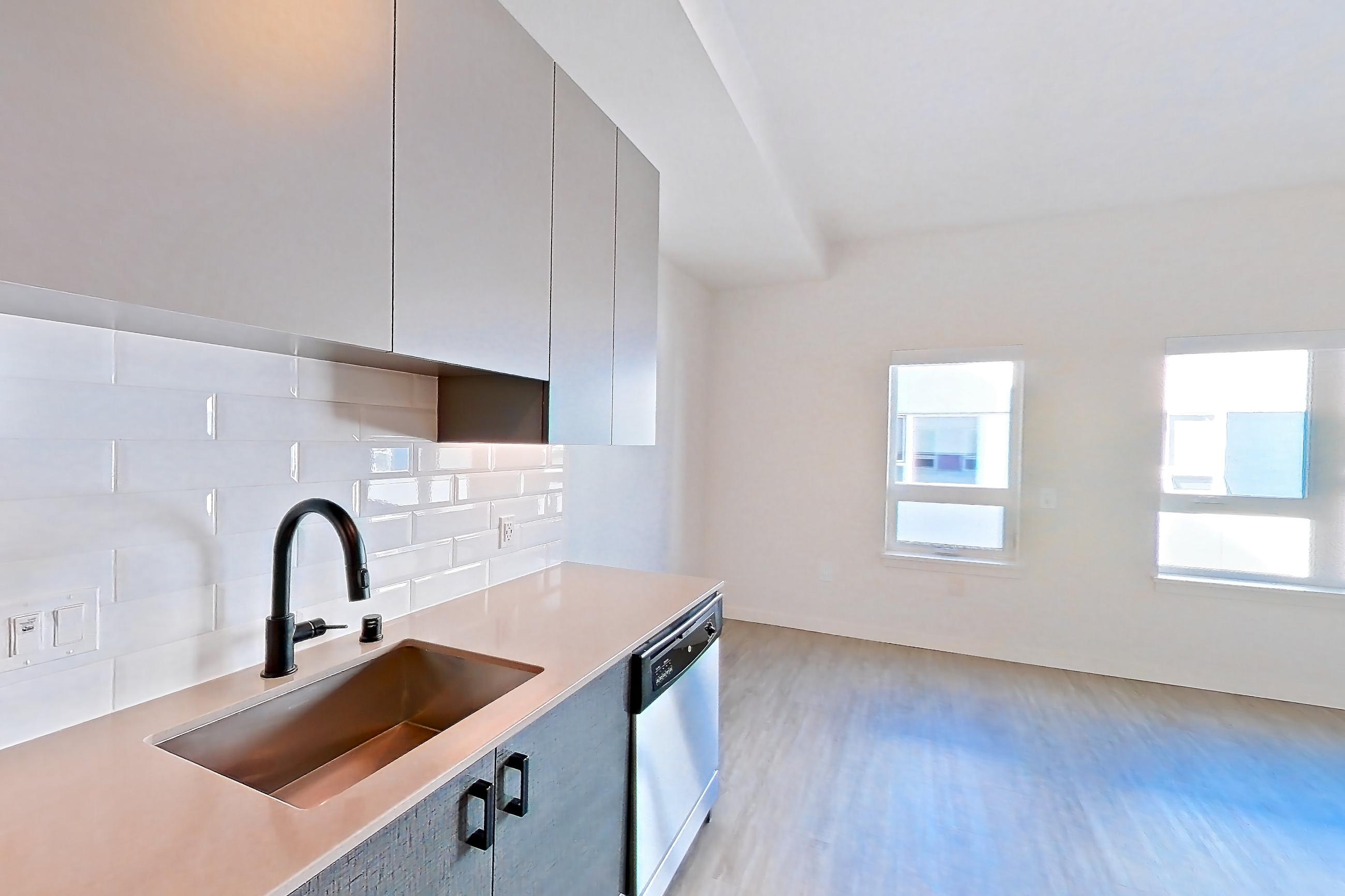 Kitchen in a U1 Furnished floor plan unit, representative of Unit 416 at Chroma