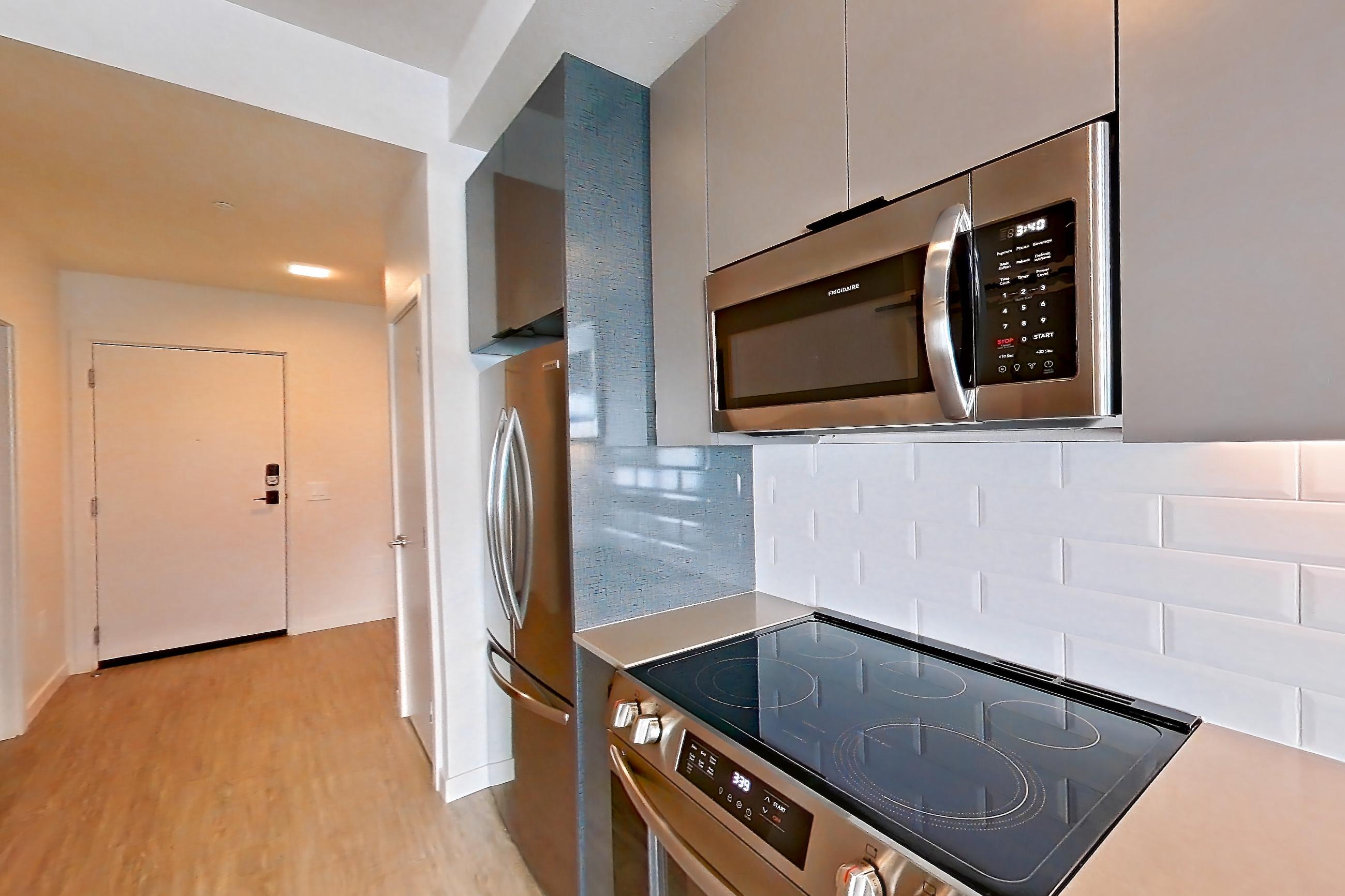 Kitchen in a U1 Furnished floor plan unit, representative of Unit 416 at Chroma
