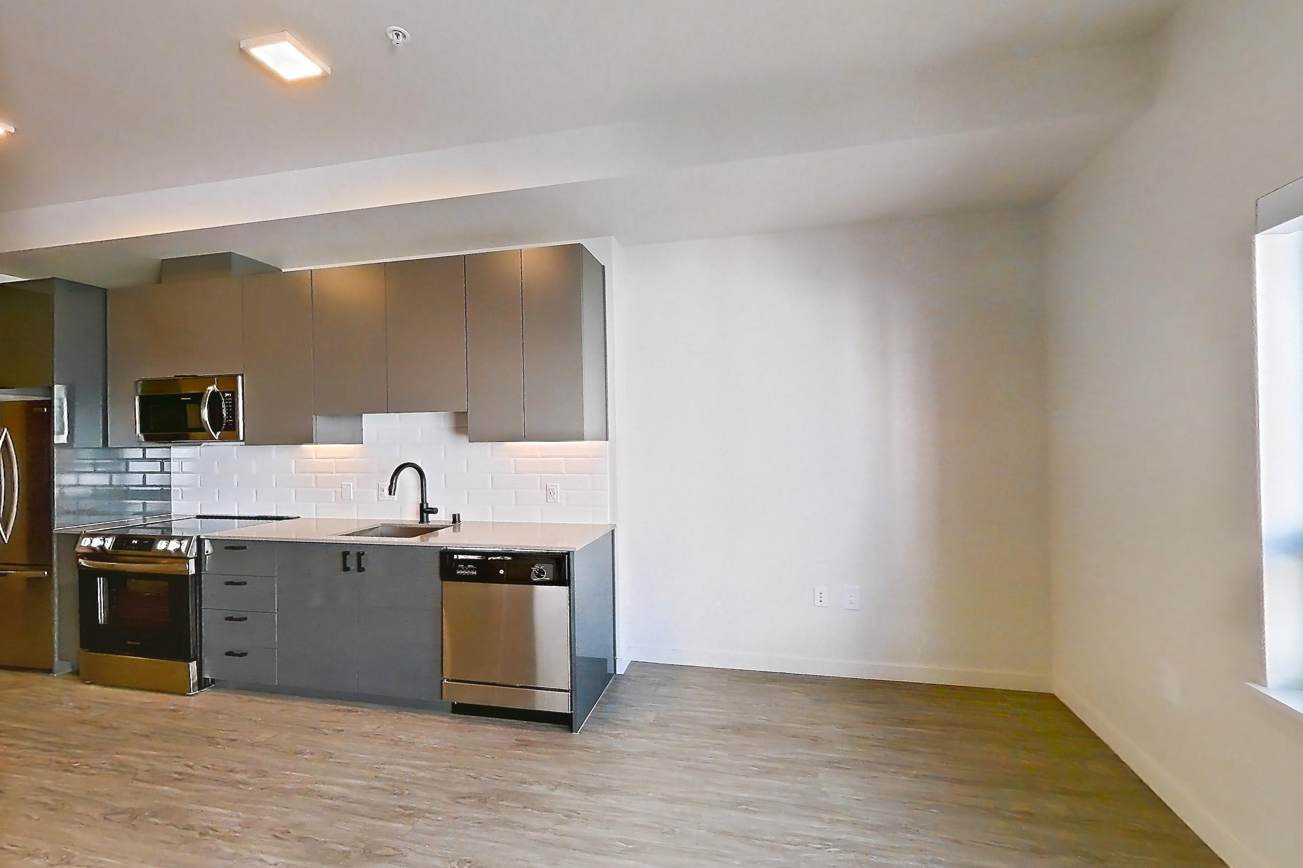 Living room in a U1 Furnished floor plan unit, representative of Unit 416 at Chroma