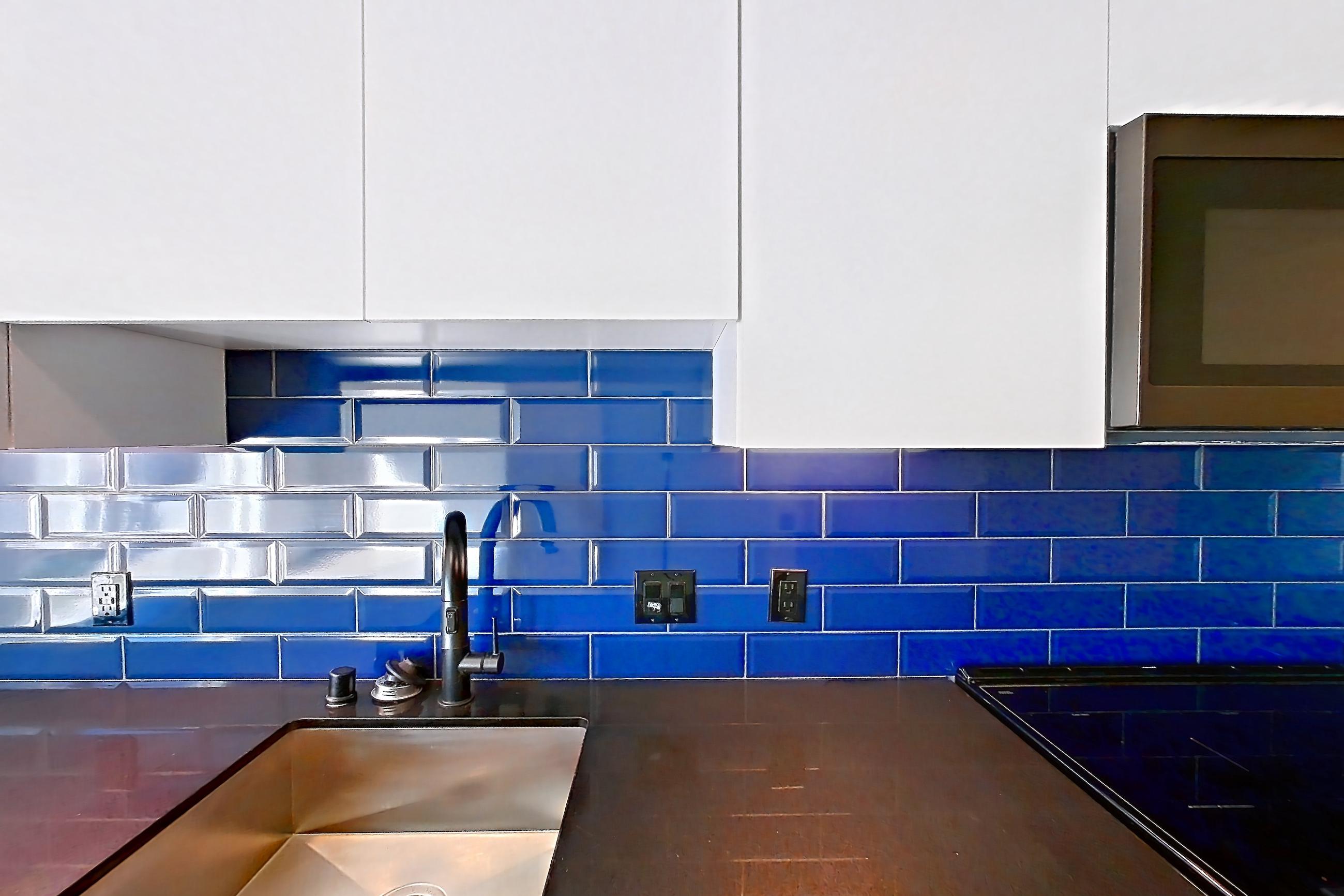 Kitchen in a U1 MFTE floor plan unit, representative of Unit 617W at Chroma