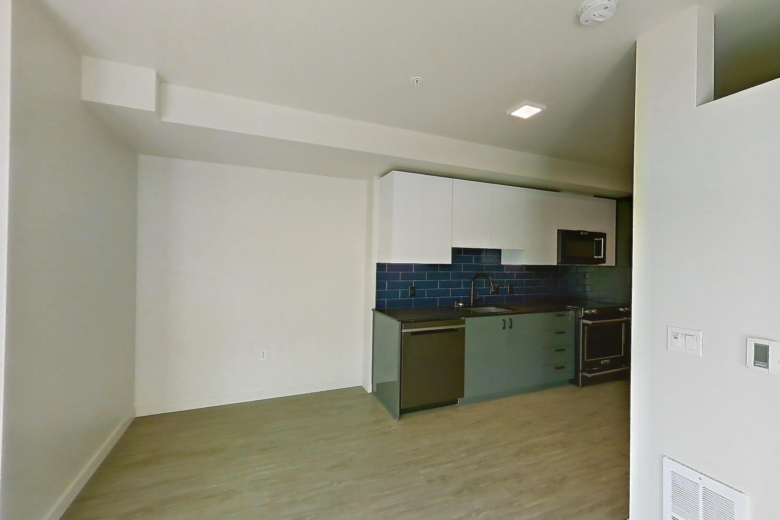 Living room in a U1 MFTE floor plan unit, representative of Unit 617W at Chroma