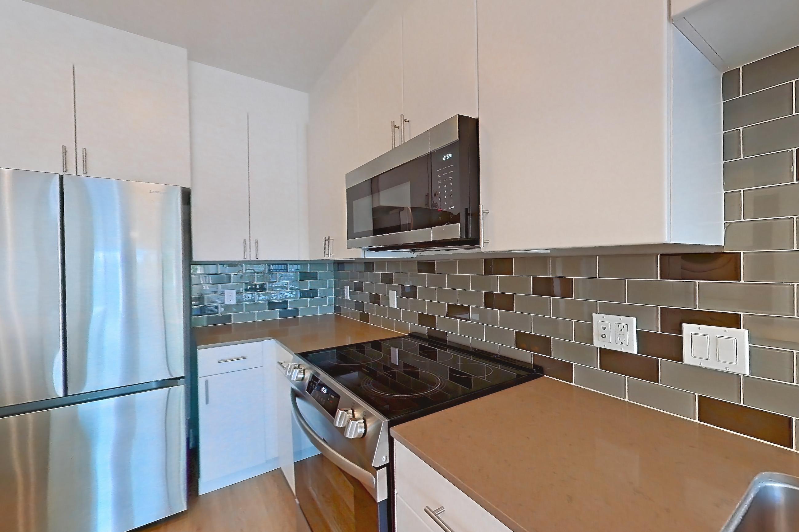 Kitchen in a A44 Premium floor plan unit, representative of Unit 226 at The Waymark